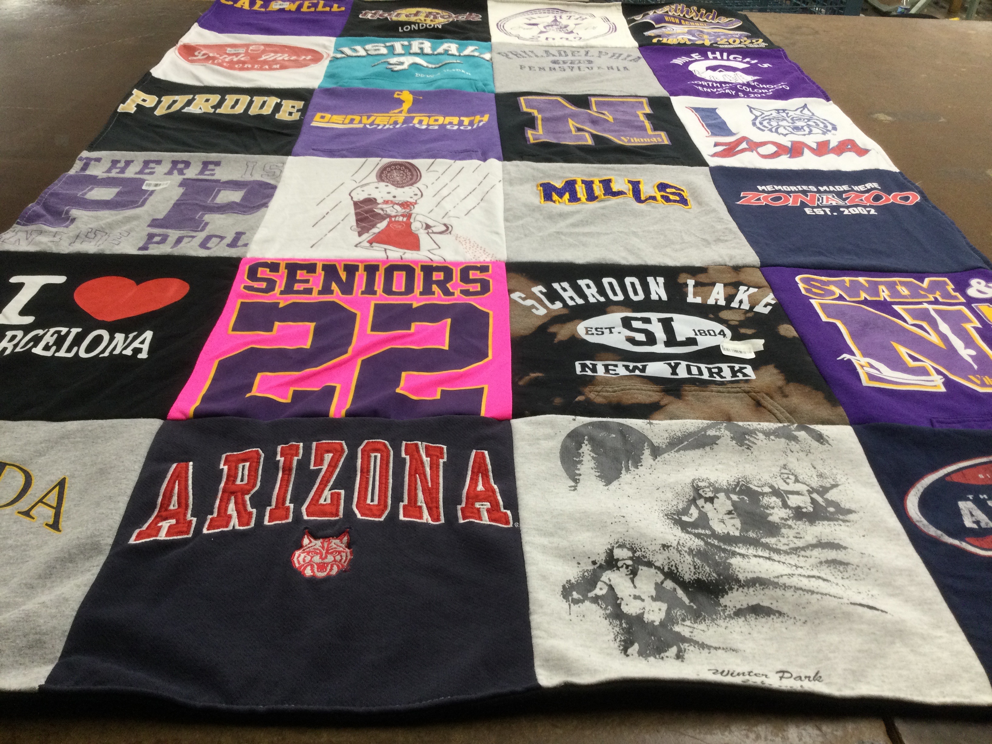 T-shirt quilt featuring university of arizona, denver north high school by Susan from CO