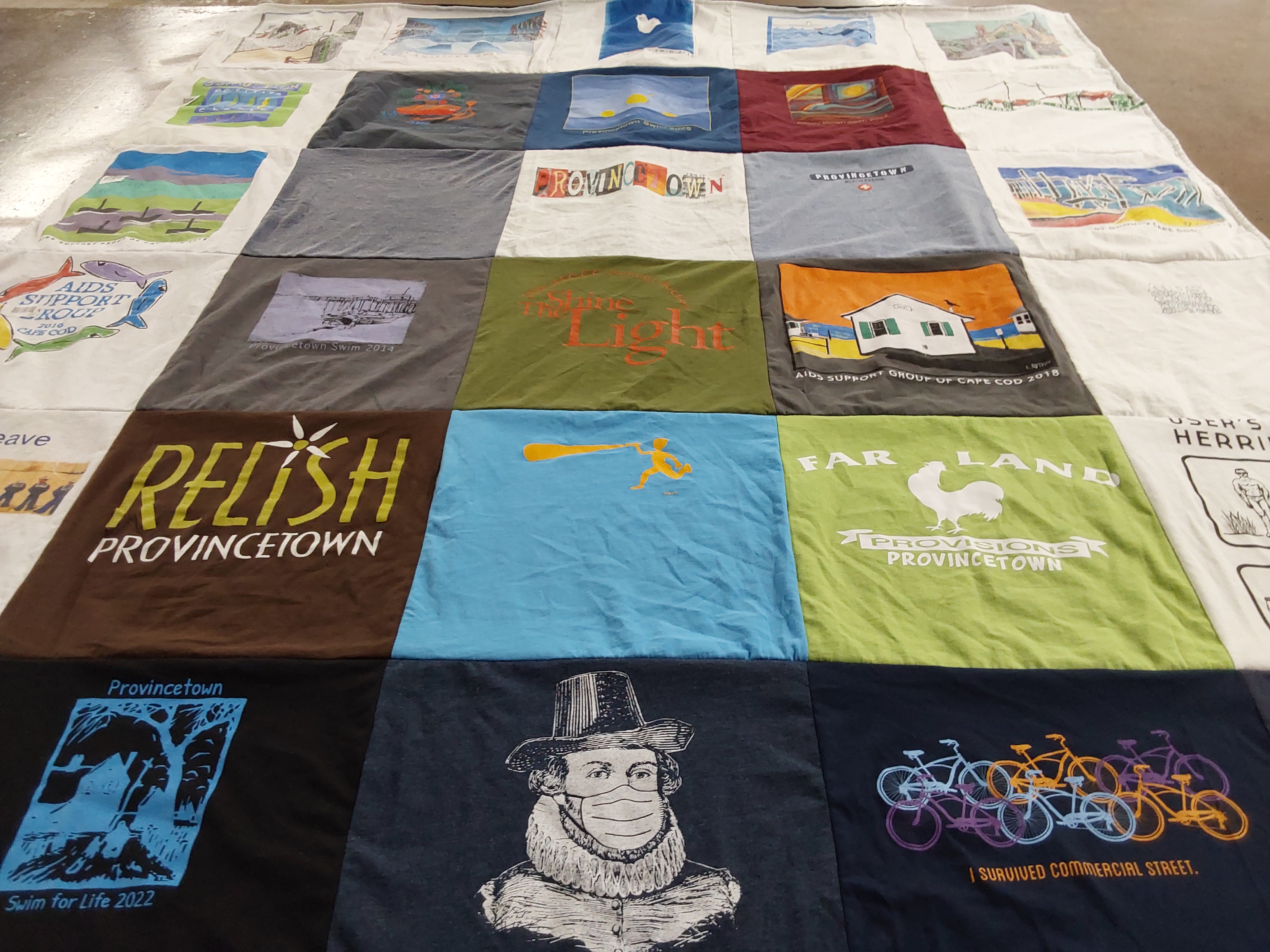 T-shirt quilt with swimming, community support themes by Rob from DE