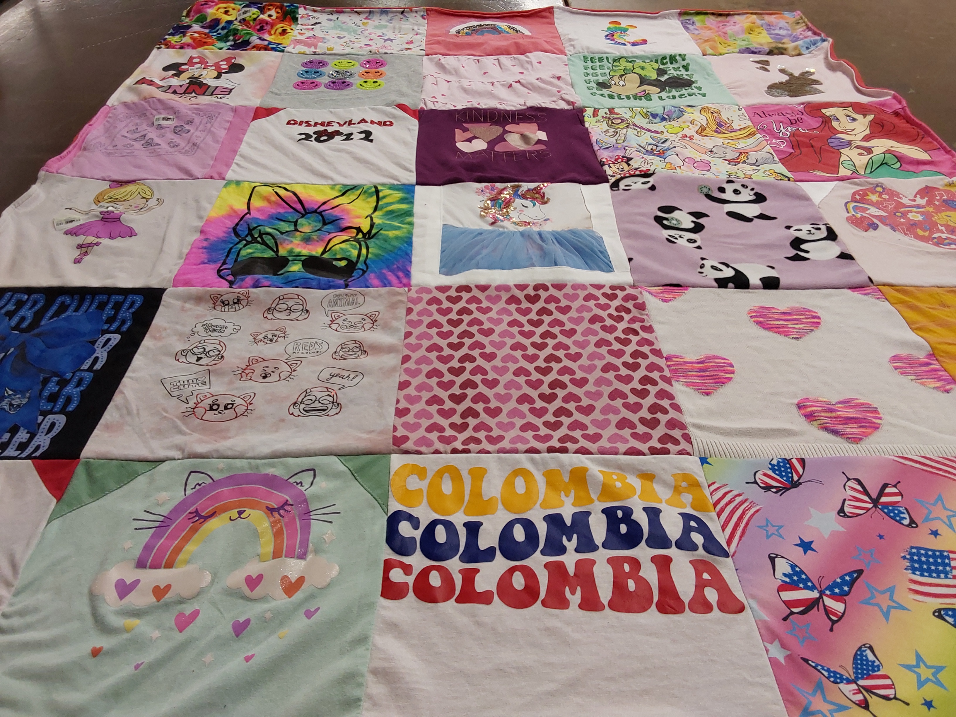T-shirt quilt with disney, comics themes by Sara from AZ