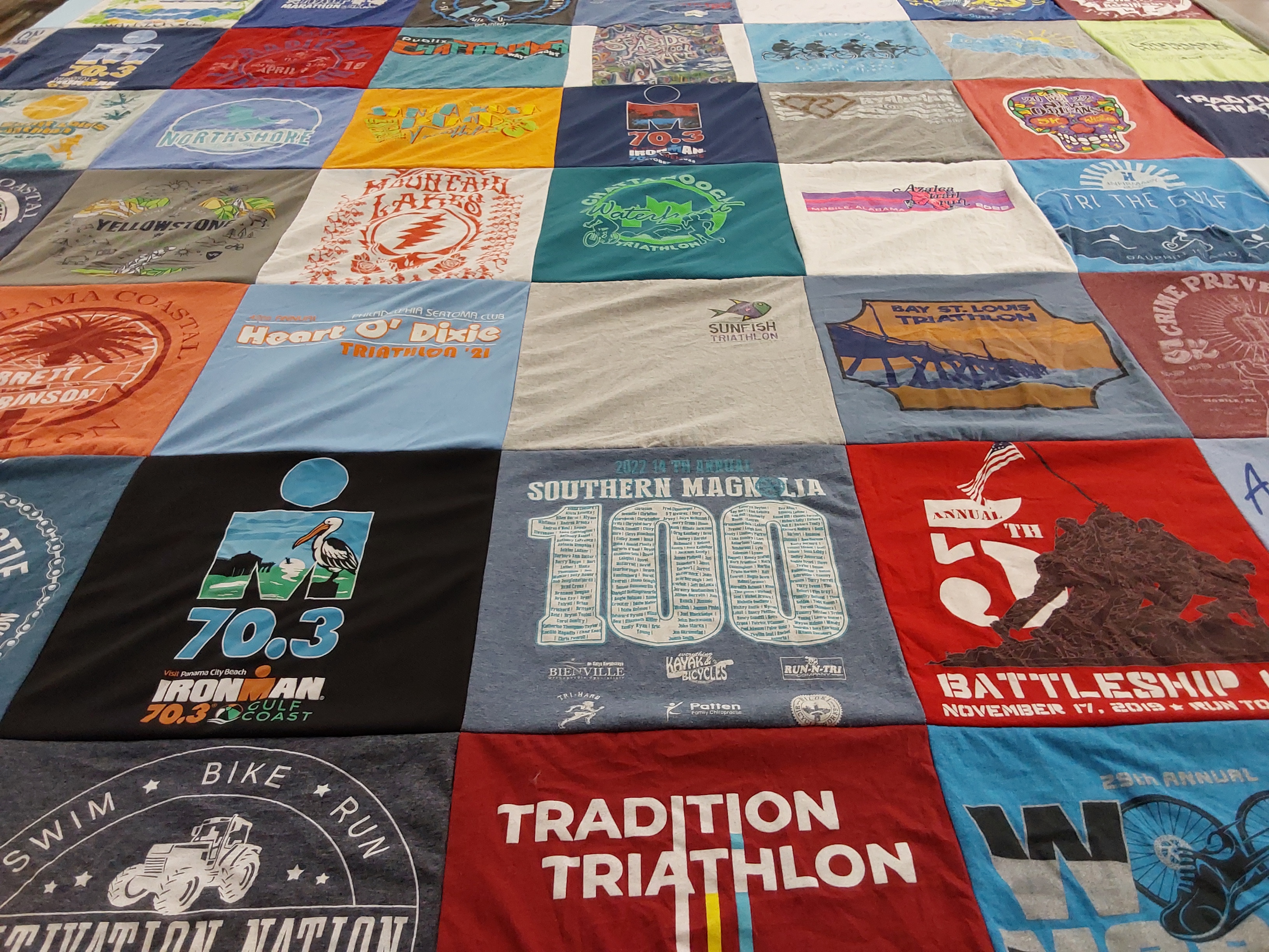 T-shirt quilt with triathlons, biking themes by Brandon from AL