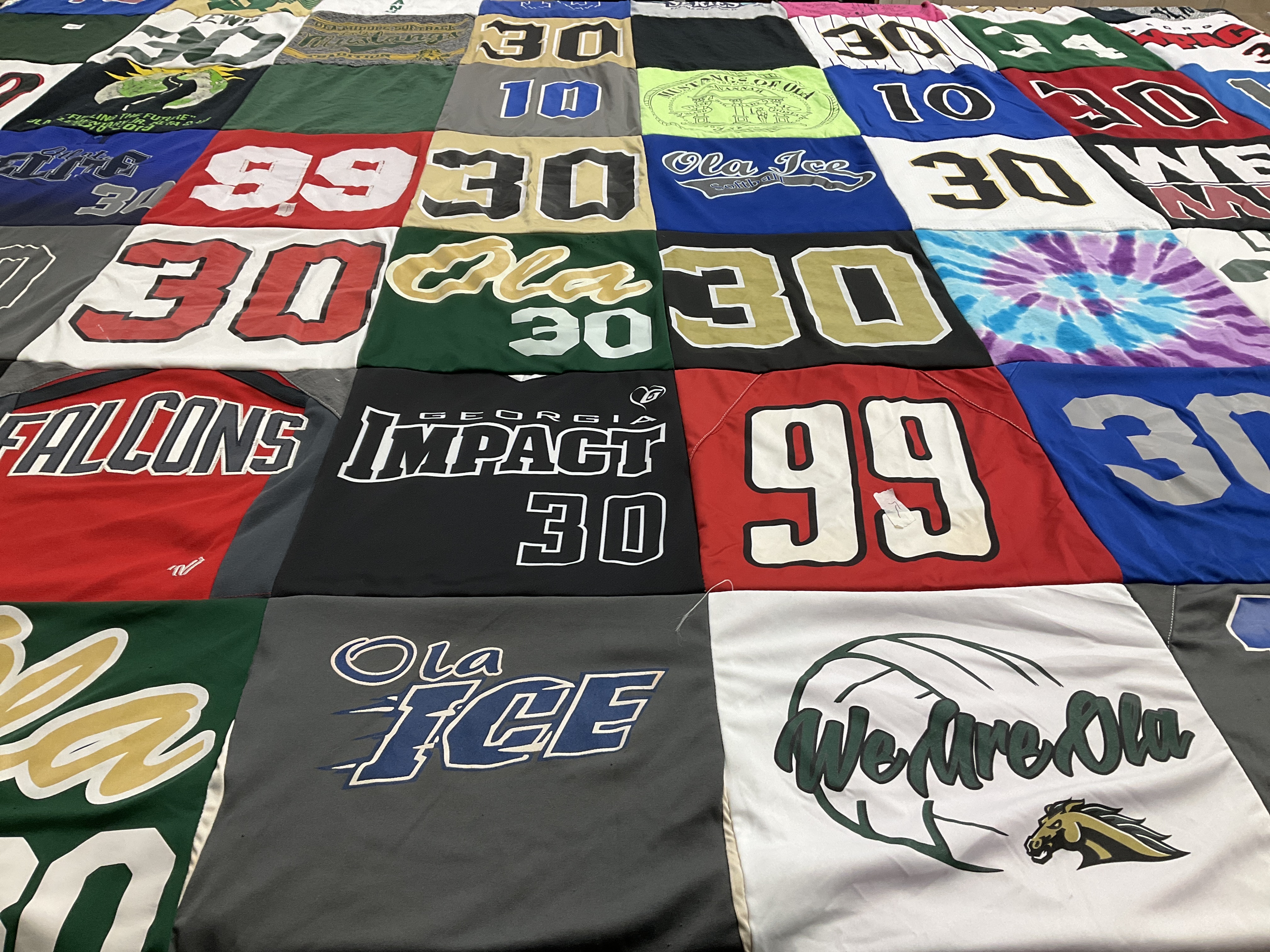 T-shirt quilt with bowling, cheerleading themes by Kelly from GA