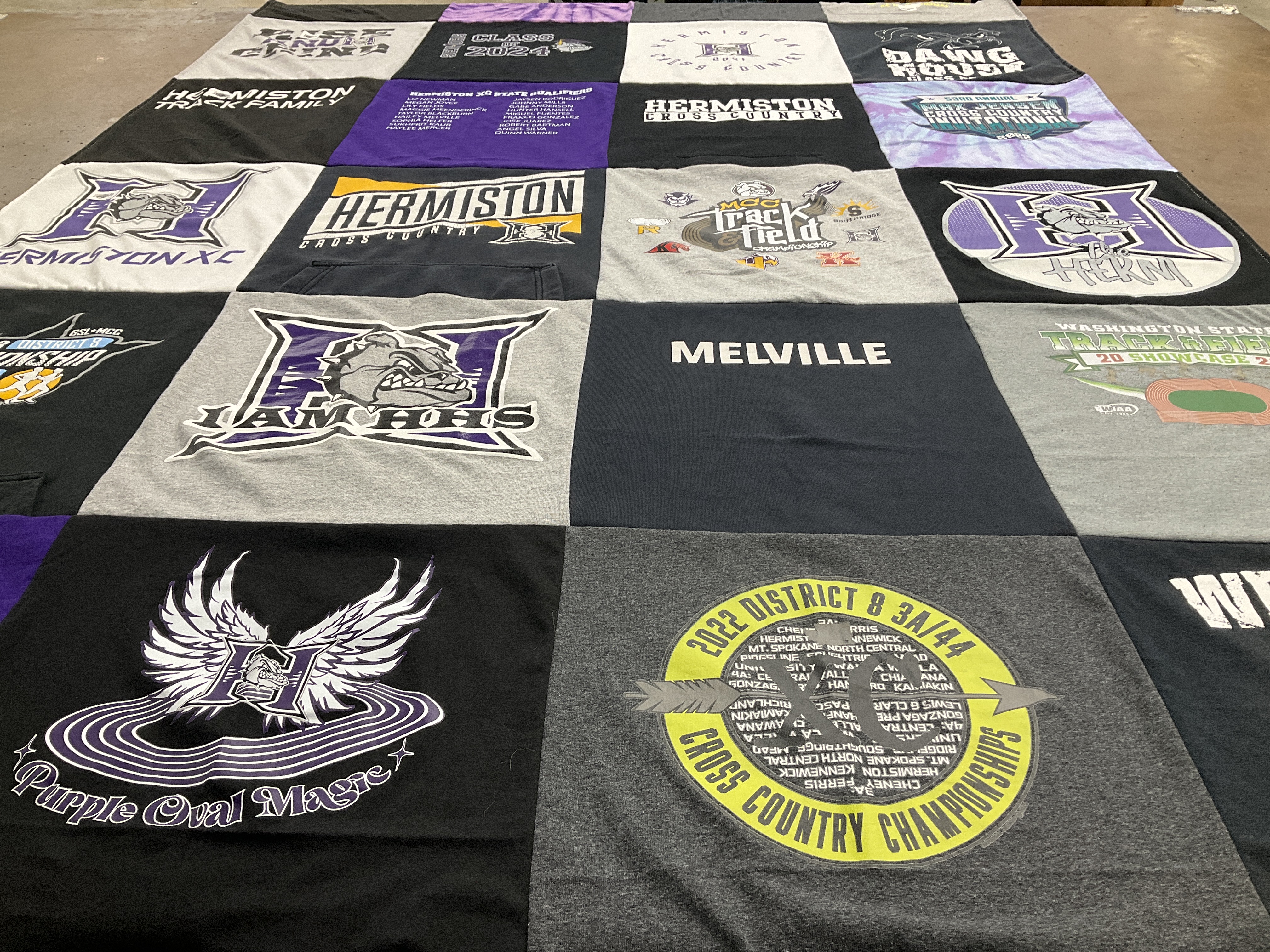 T-shirt quilt featuring hermiston high school cross country team, hermiston high school track team by DavidnAmanda from OR