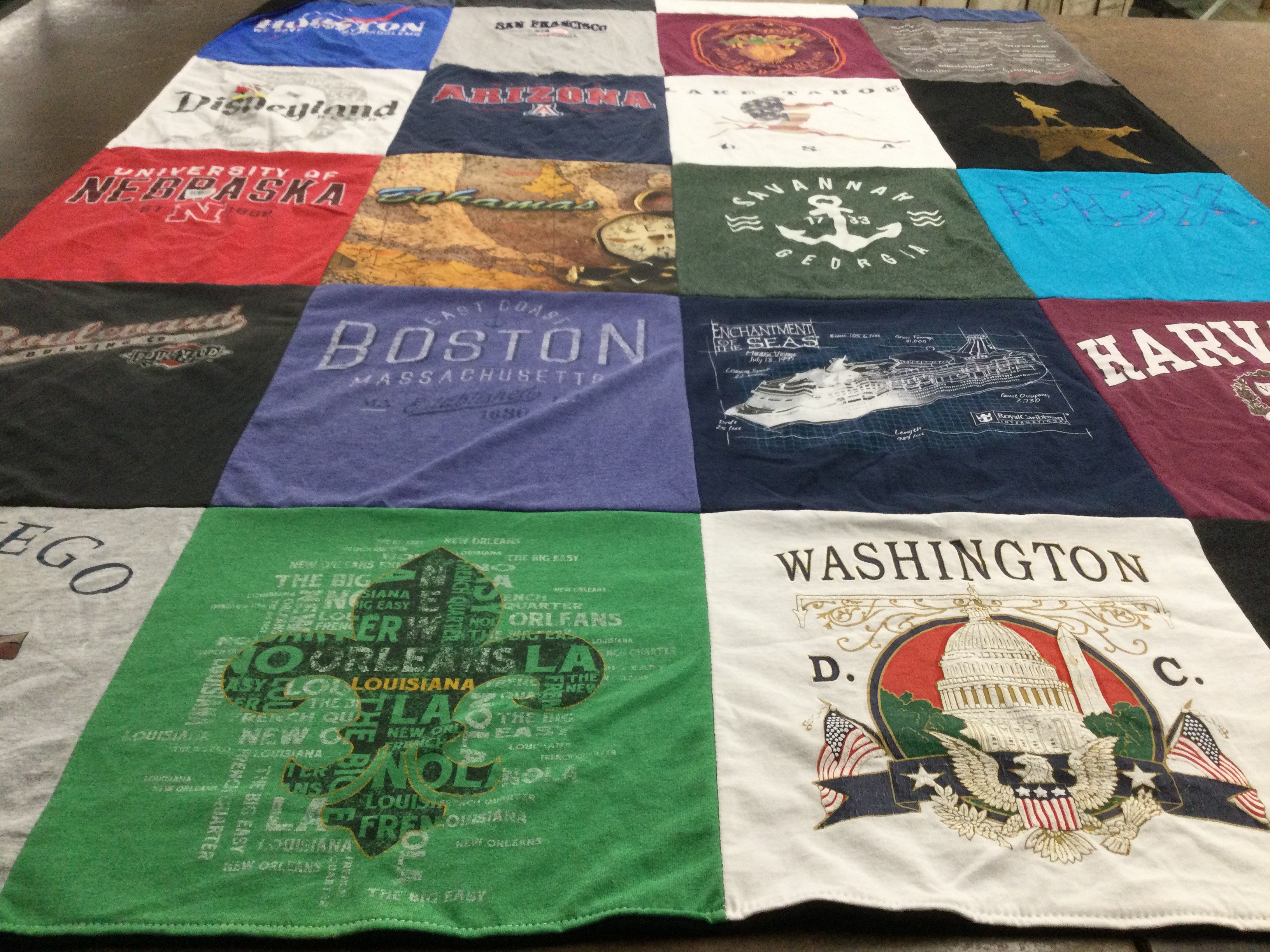 T-shirt quilt with travel, education themes by Catherine from AZ