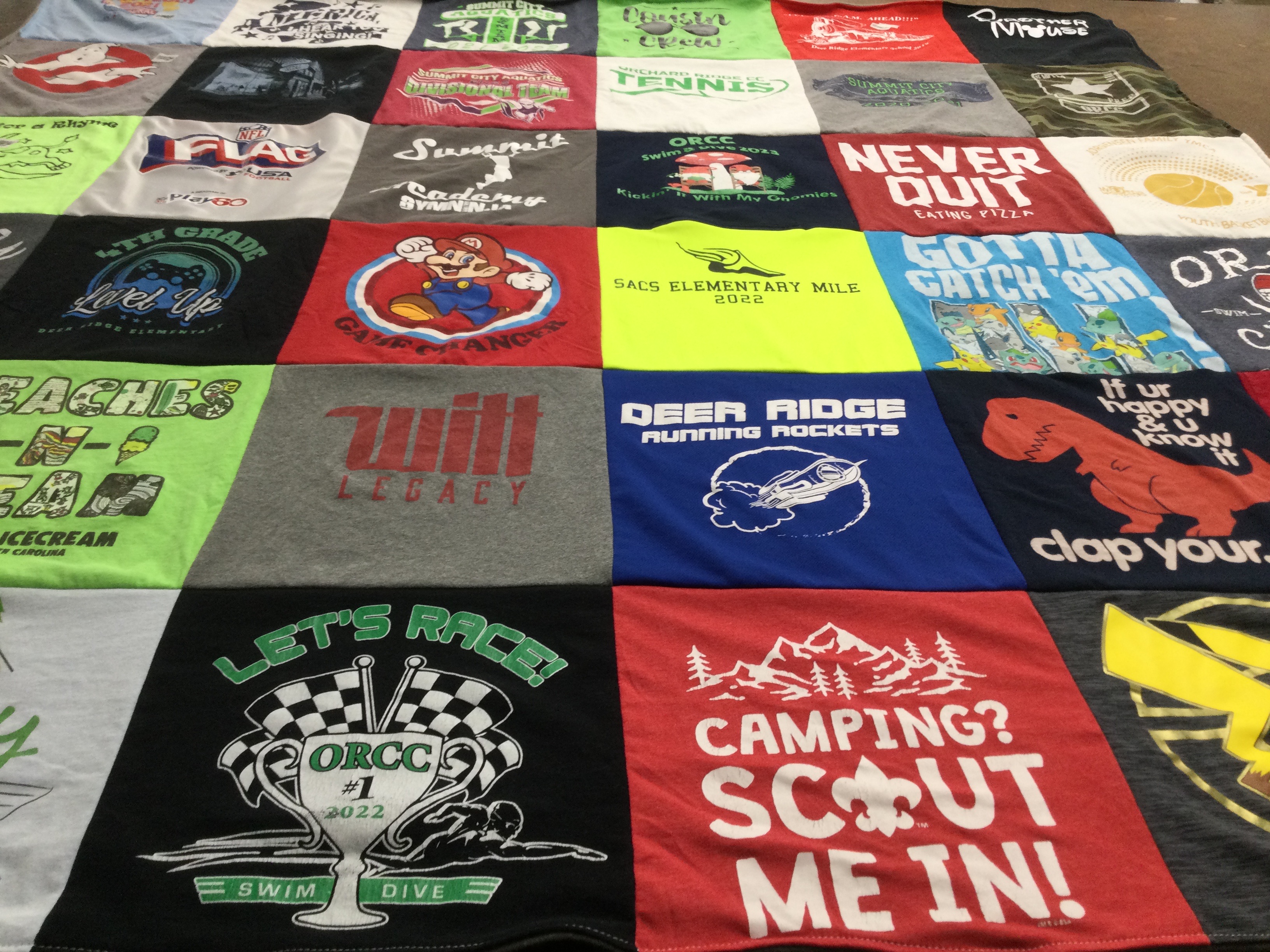 T-shirt quilt featuring deer ridge running rockets by Nancy from IN