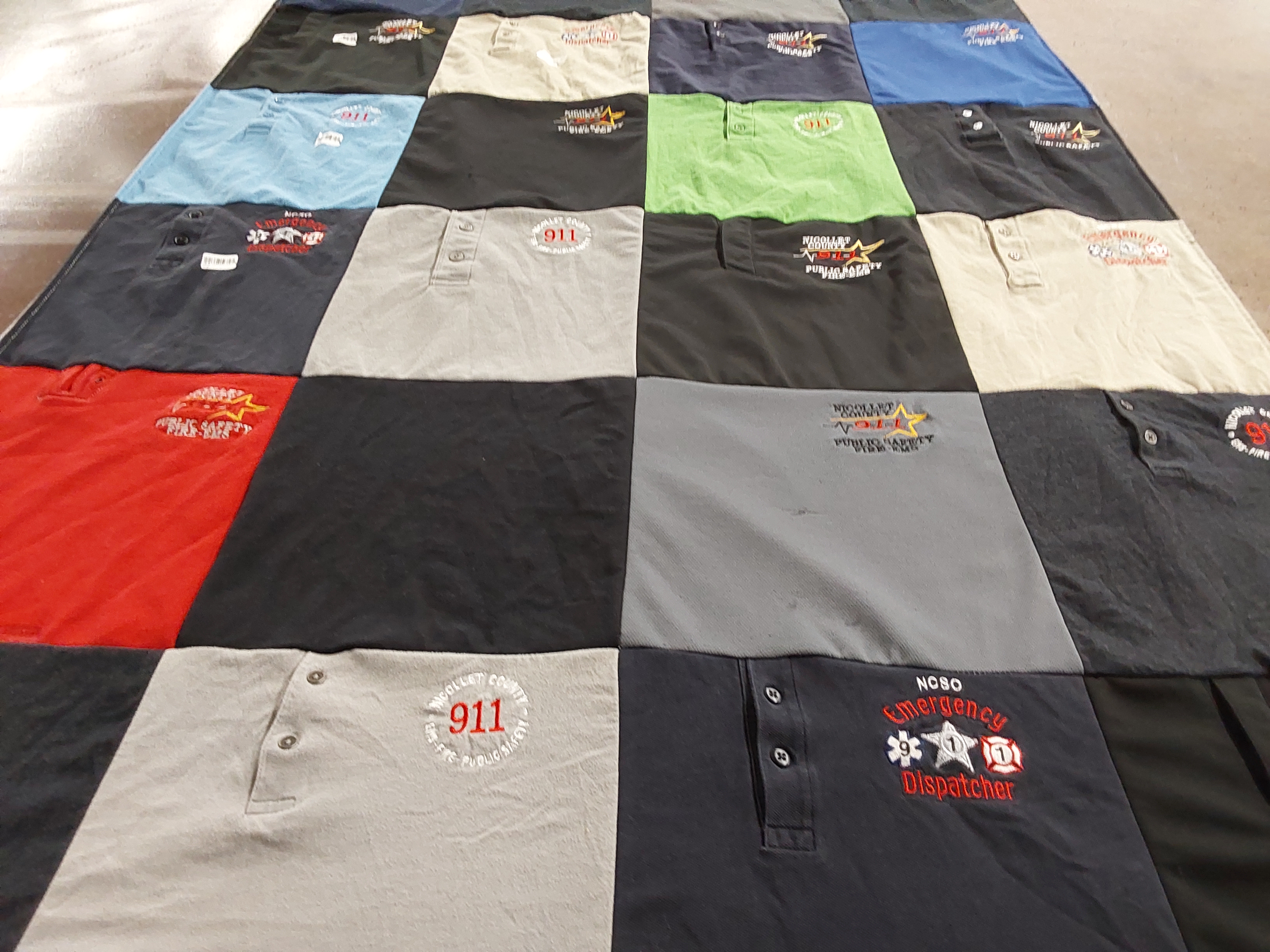 T-shirt quilt with public safety, emergency services themes by Heather from MN