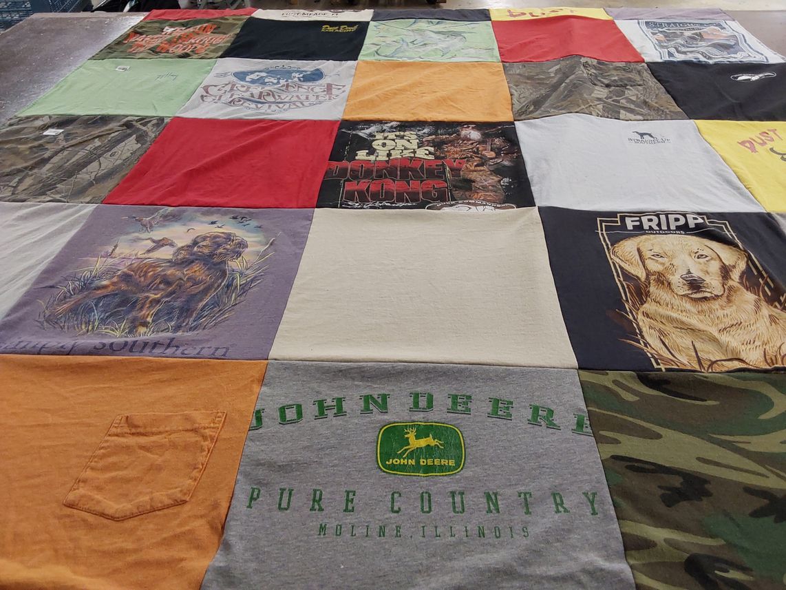 T-shirt quilt with hunting, fishing themes by Lynda from FL