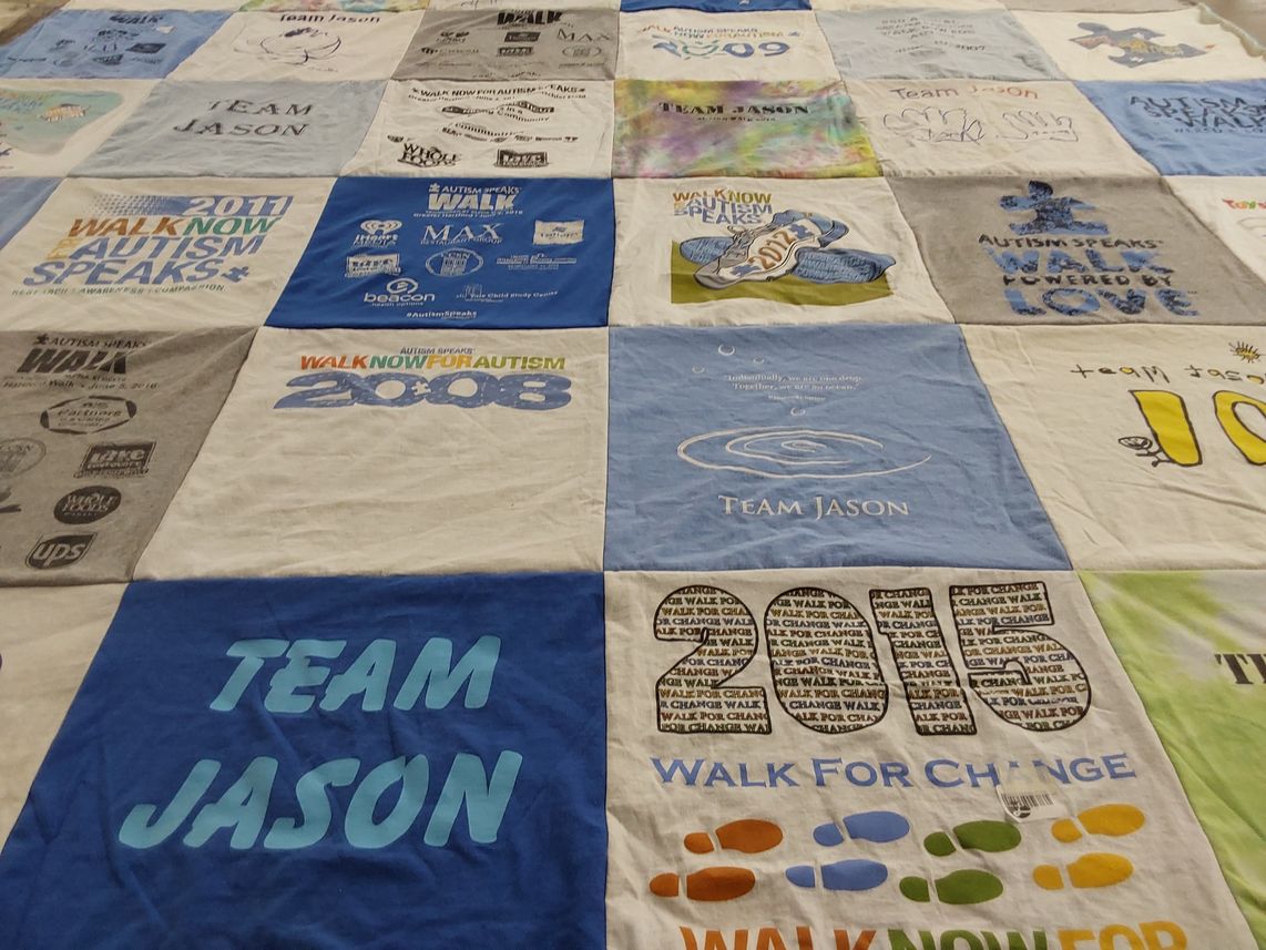 T-shirt quilt with autism awareness, community support themes by Cassandra from CT