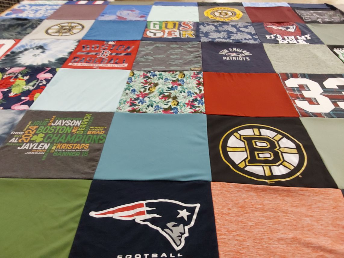 T-shirt quilt featuring boston bruins, new england patriots by Kristina from NH