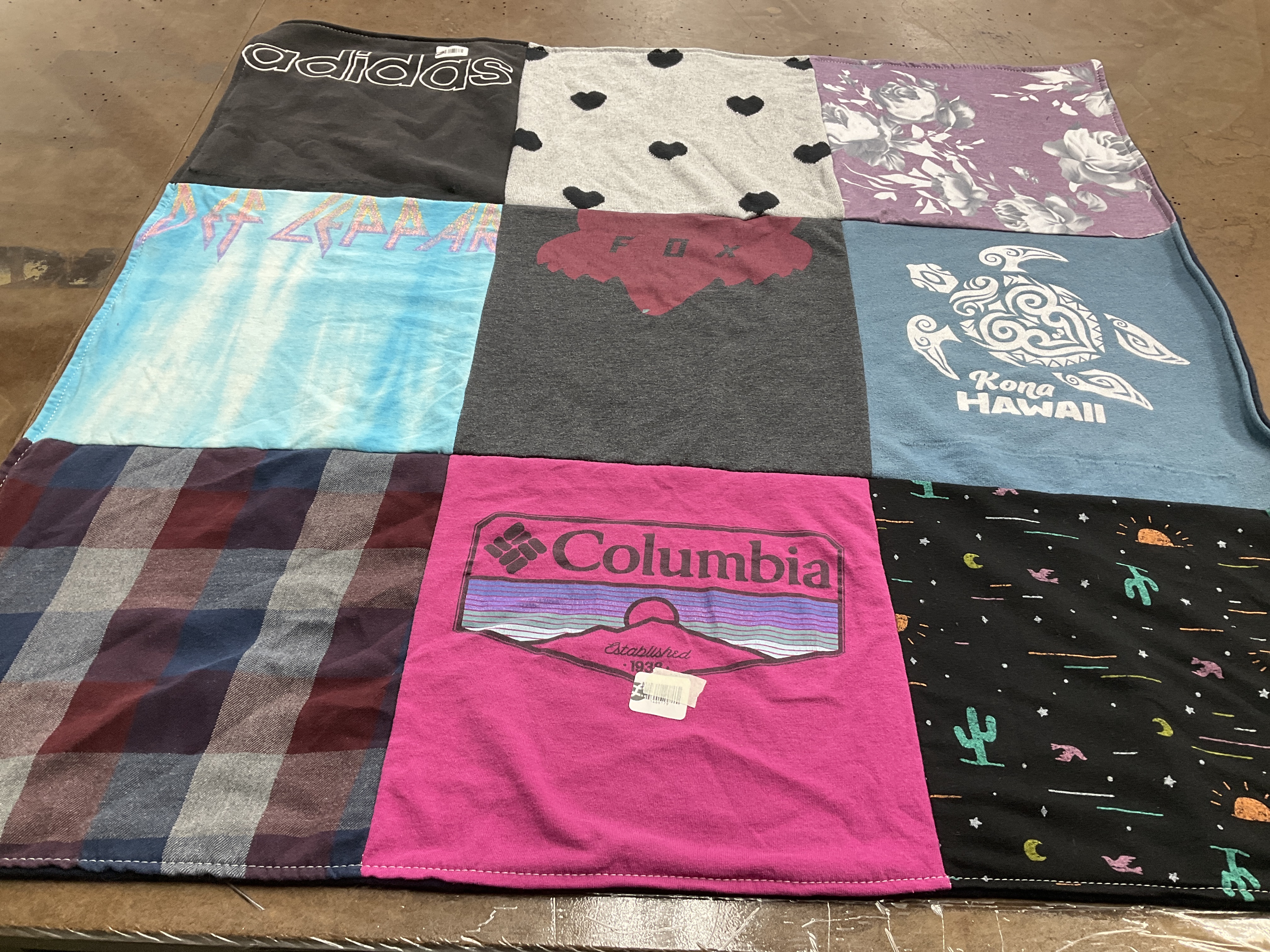 T-shirt quilt with music, travel themes by Mikela from CA