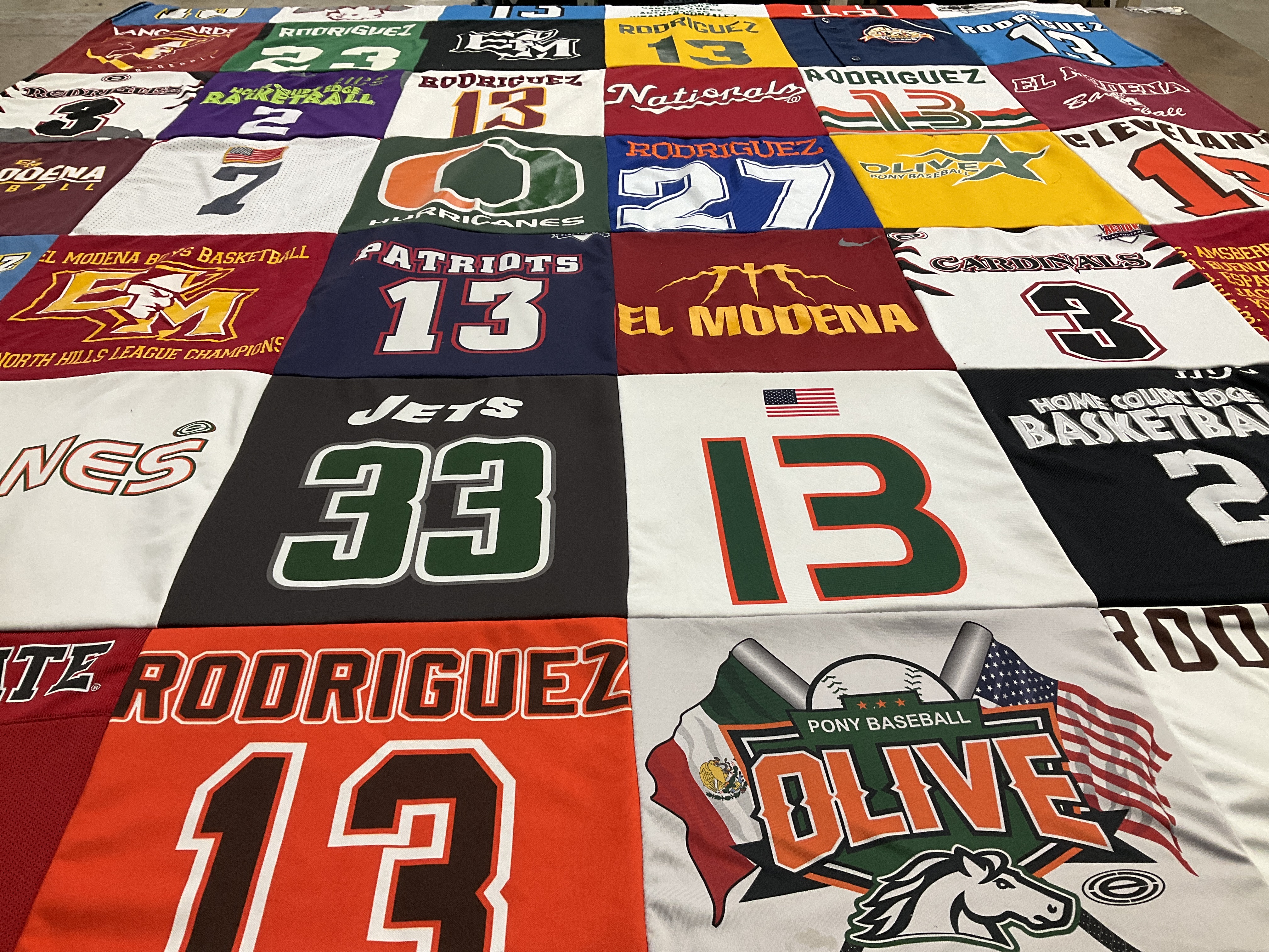 T-shirt quilt featuring olive little league by Karen from CA