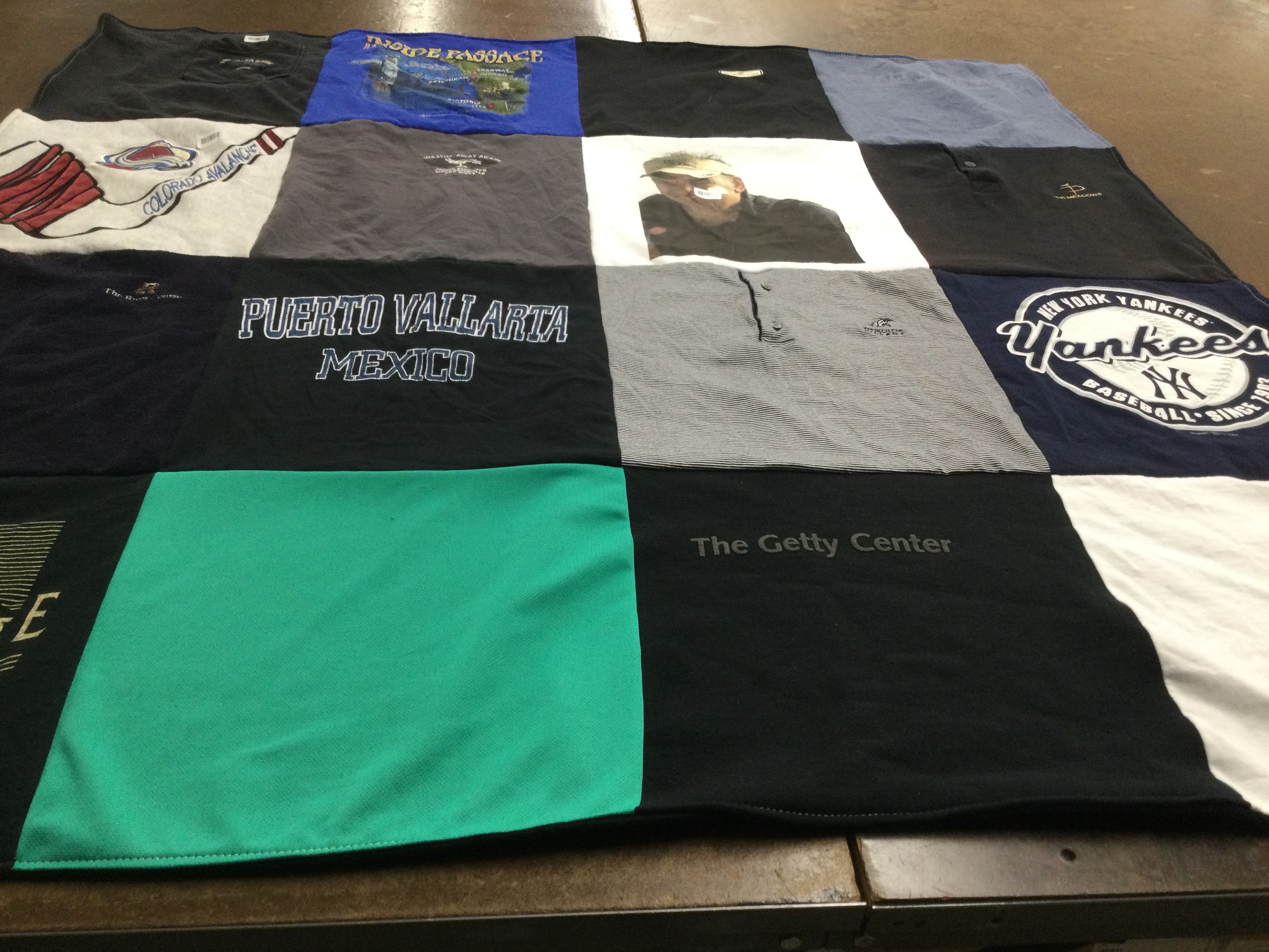 T-shirt quilt with sports, travel themes by Pamela from CO