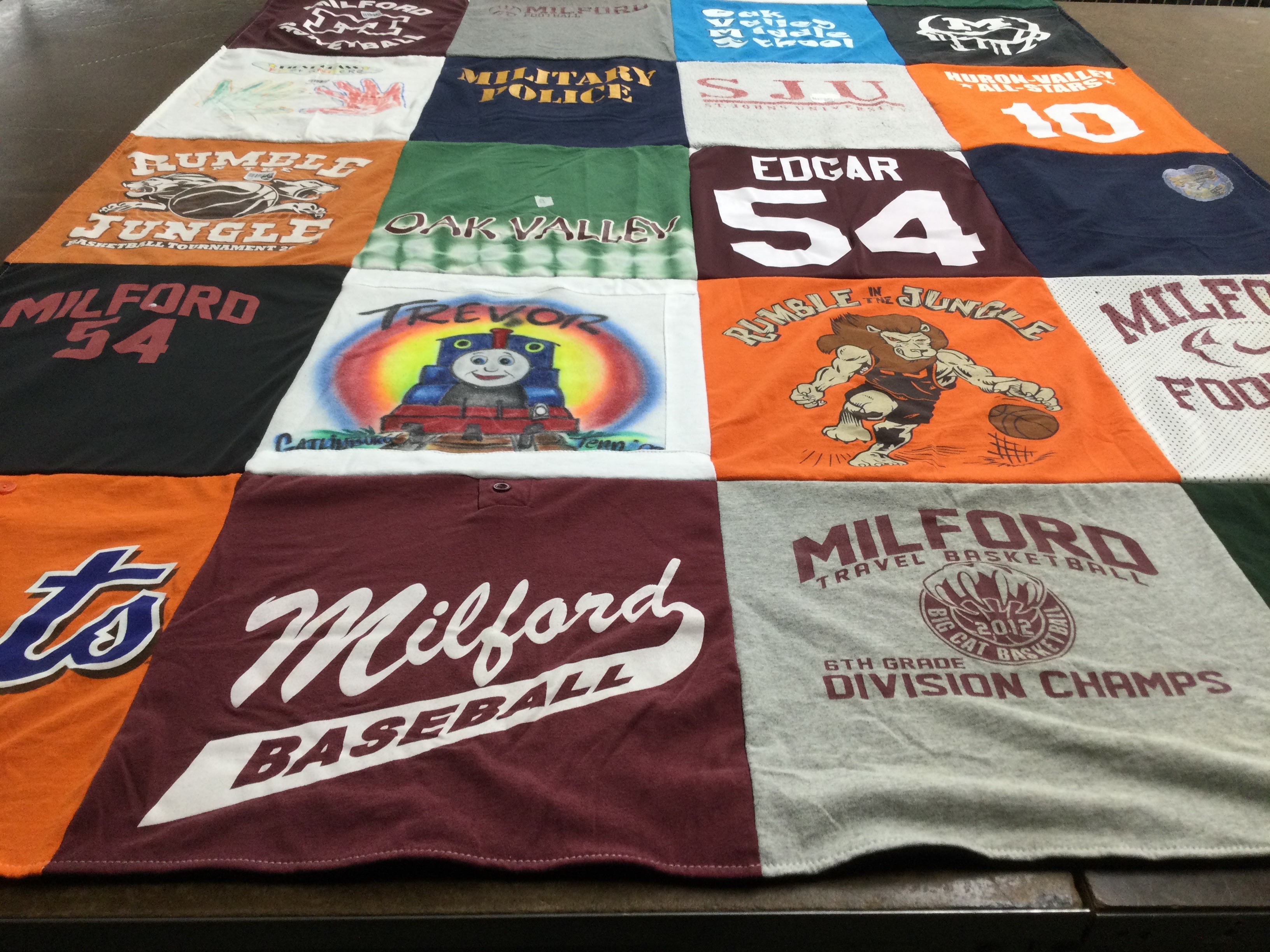 T-shirt quilt featuring milford travel basketball by Scott from MI