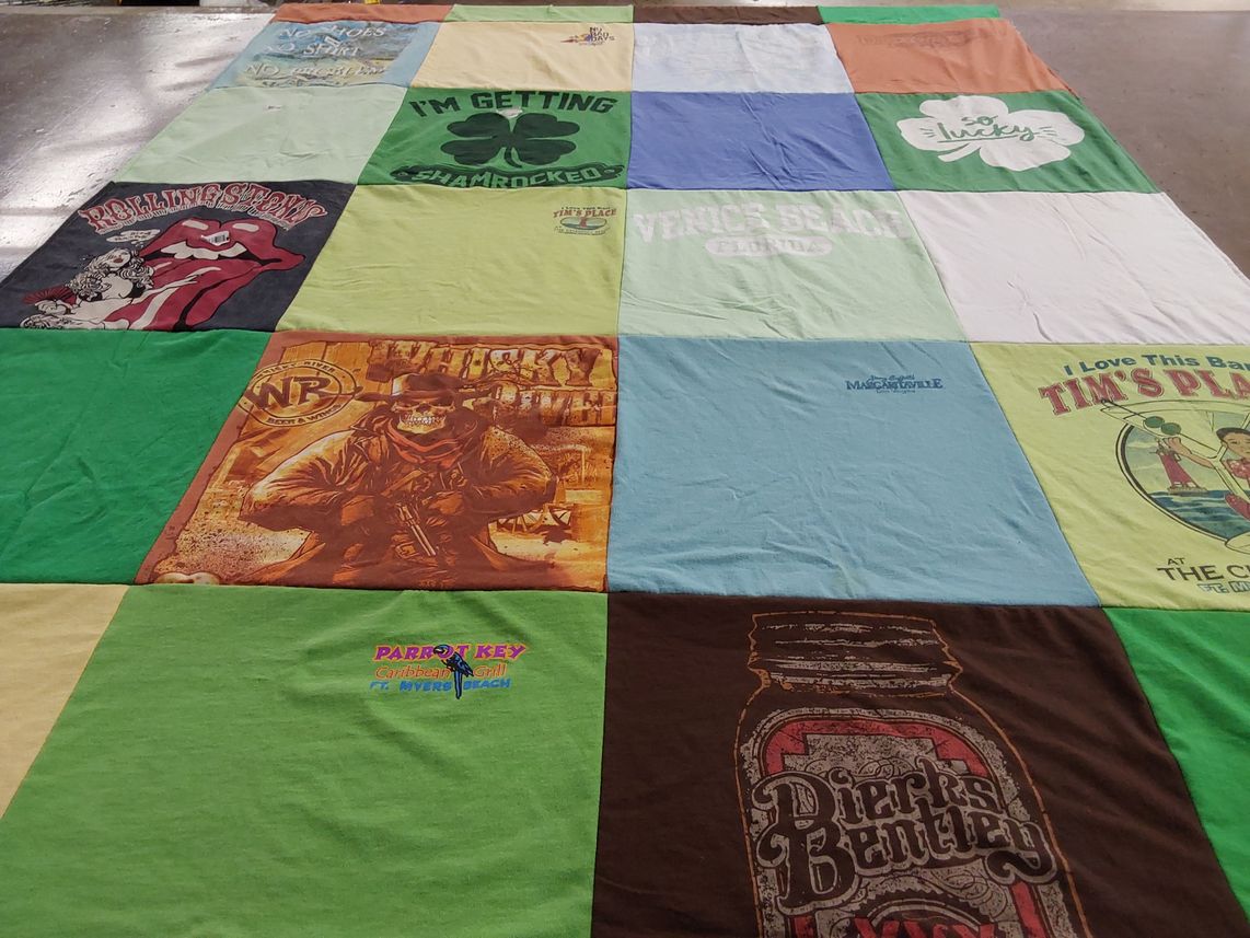 T-shirt quilt with beach, music themes by Mary from NY