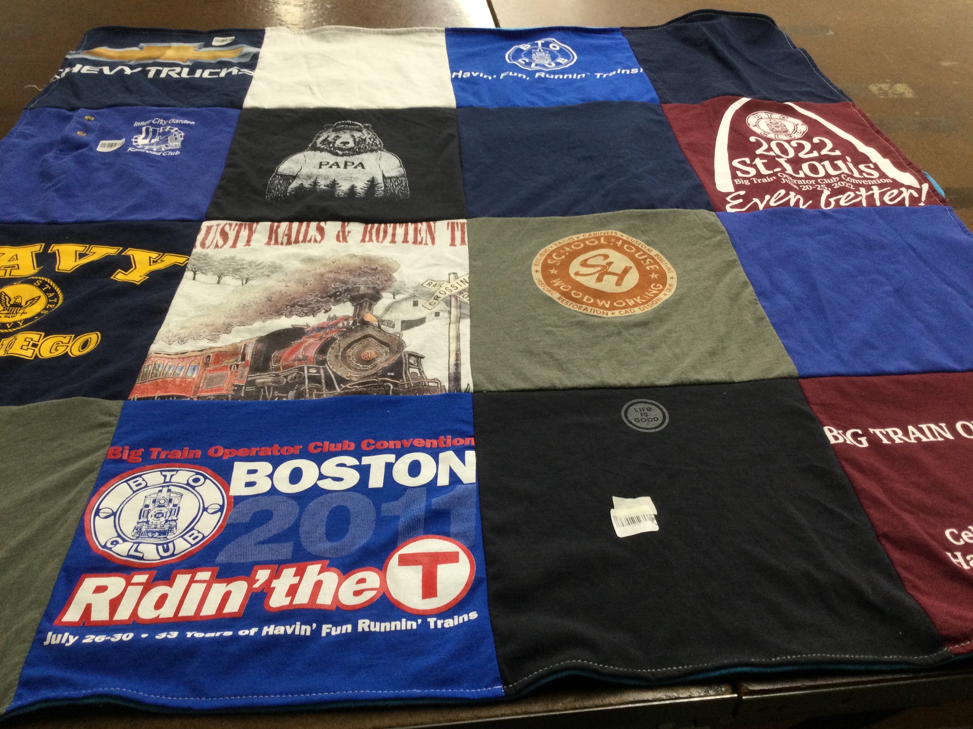 T-shirt quilt with trains, woodworking themes by Diane from MA