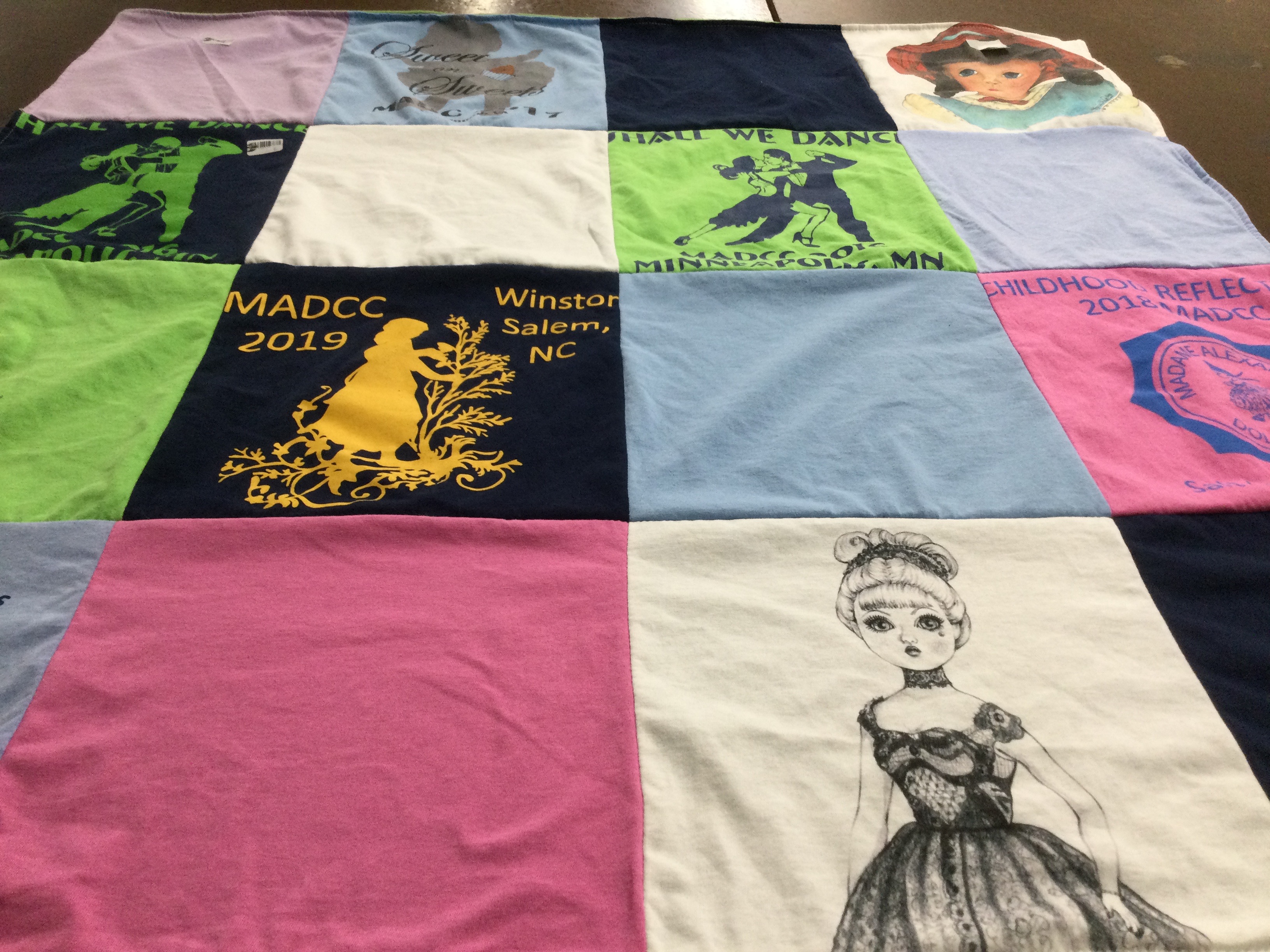 T-shirt quilt with dancing themes by Barbara from NY