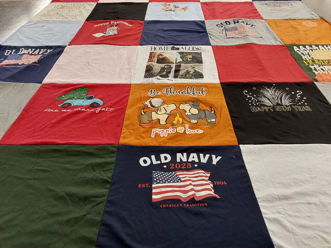 T-shirt quilt with pets, holiday celebrations themes by Katherine from IN