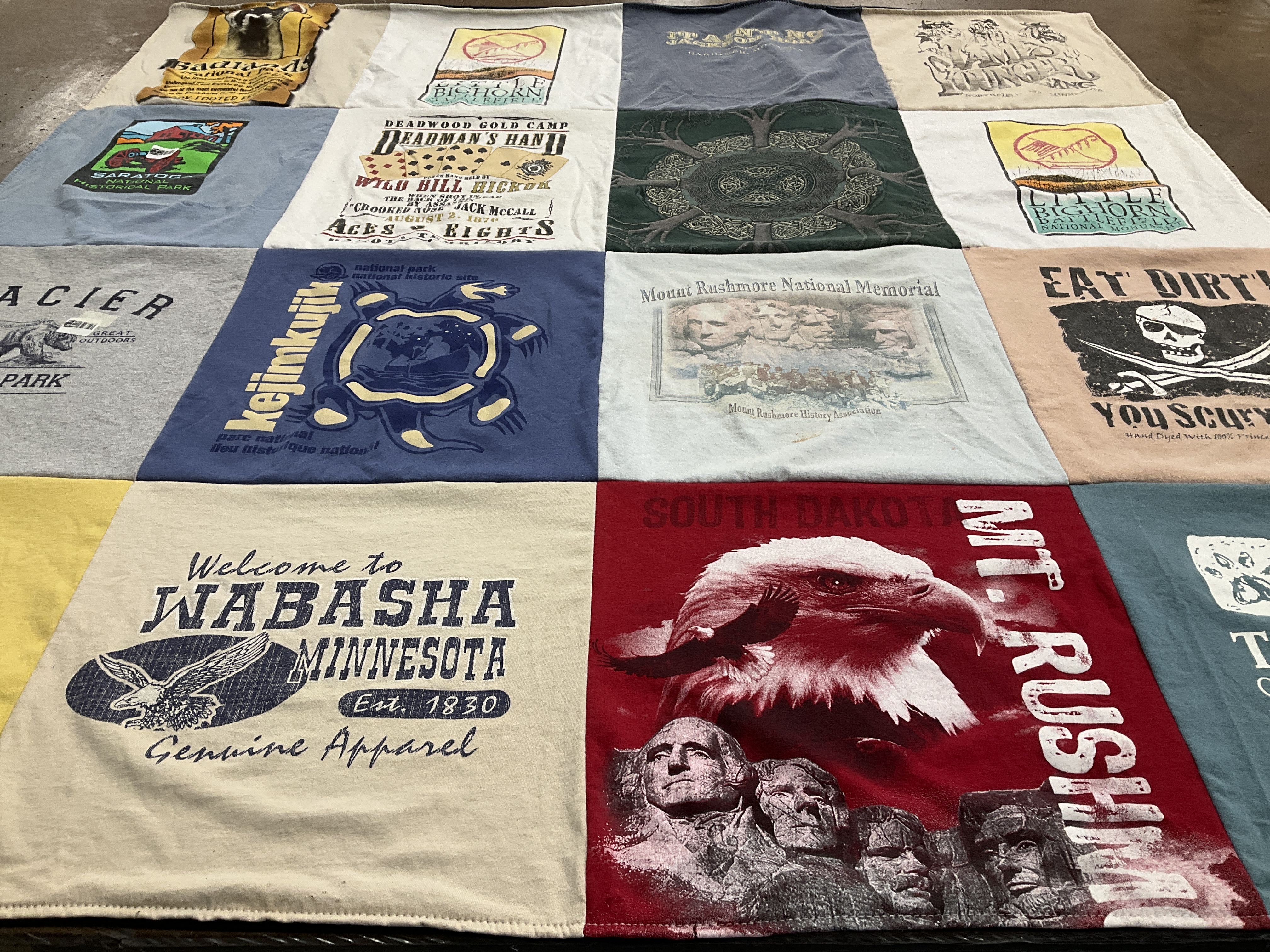T-shirt quilt with national parks, history themes by Linda from MA