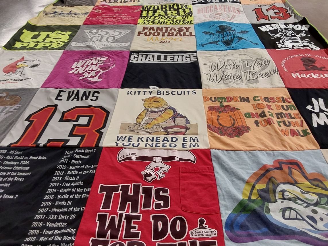 T-shirt quilt with fantasy football, charity run themes by christy from IL