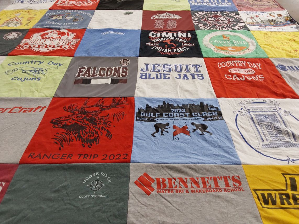 T-shirt quilt featuring jesuit blue jays, country day cajuns by susan from LA