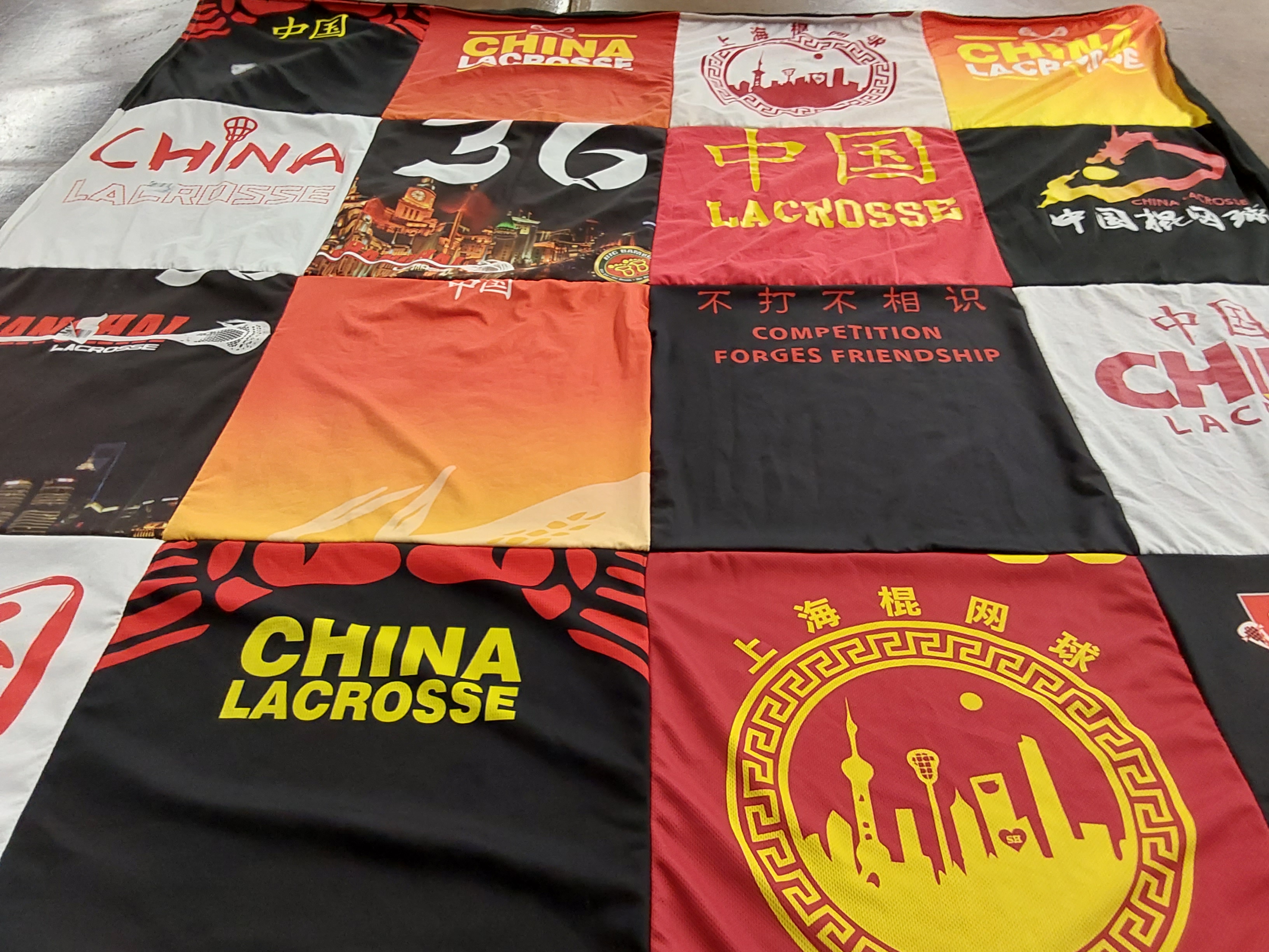 T-shirt quilt with lacrosse, sports themes by Morgan from MA
