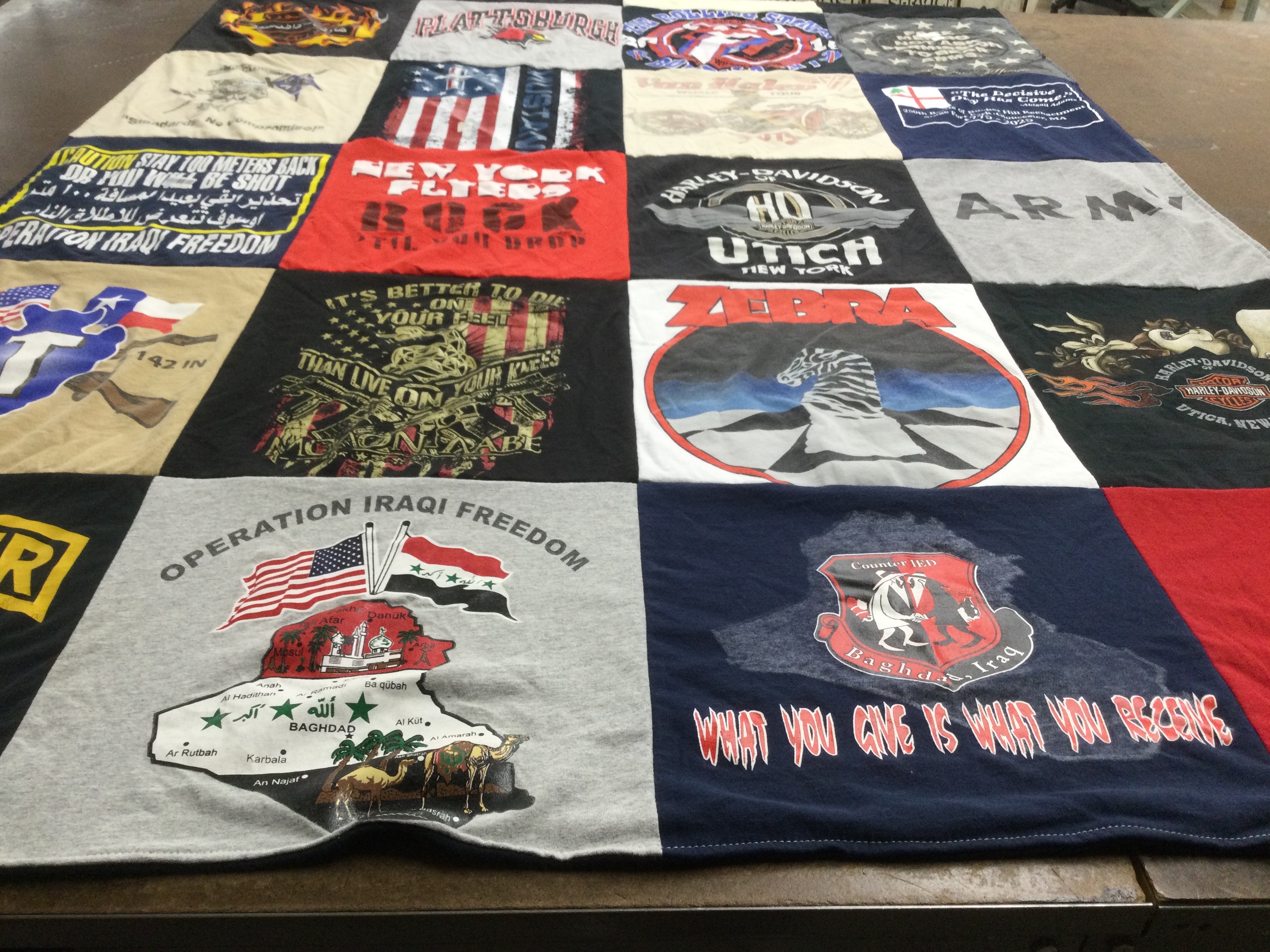 T-shirt quilt with military, motorcycles themes by Justine from NY