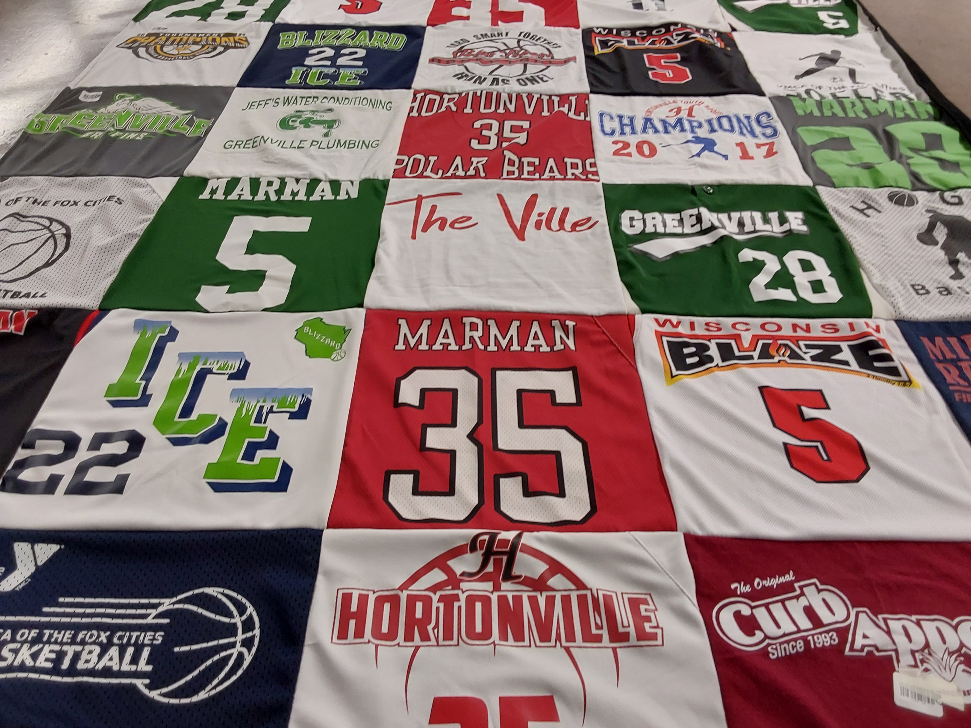 T-shirt quilt featuring wisconsin blaze by Angela from WI