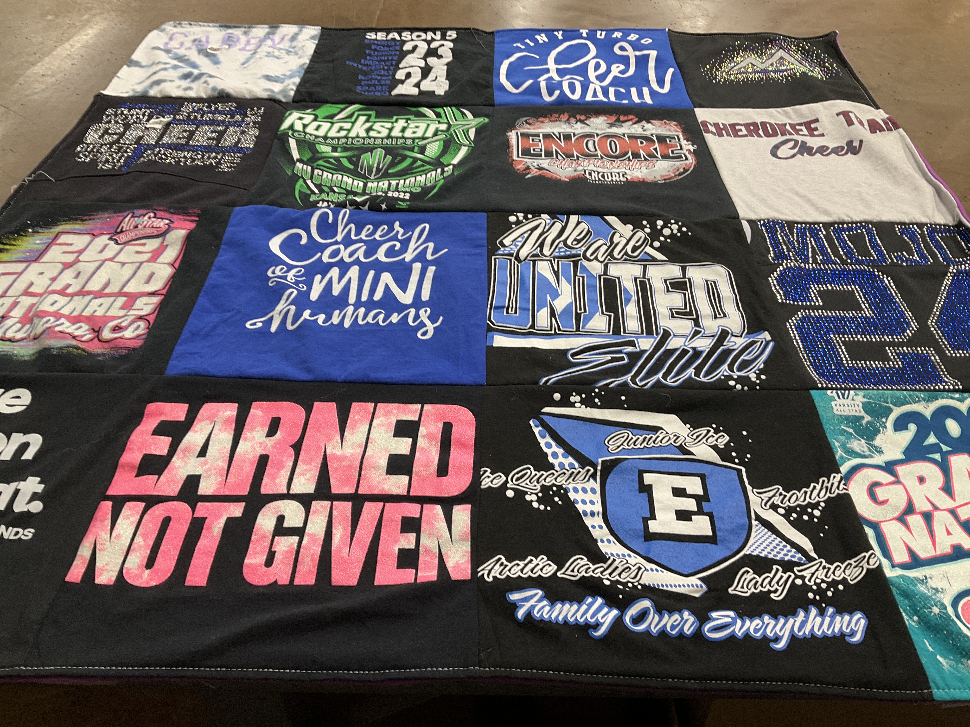 T-shirt quilt with cheerleading themes by Leah from CO