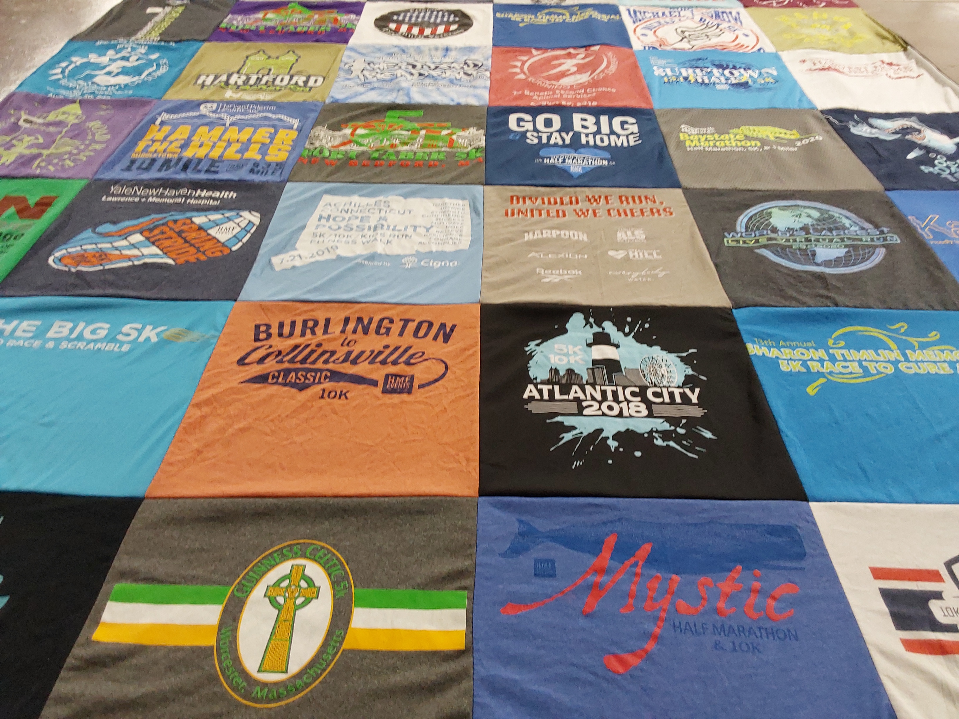 T-shirt quilt with running, marathons themes by Beth from MA