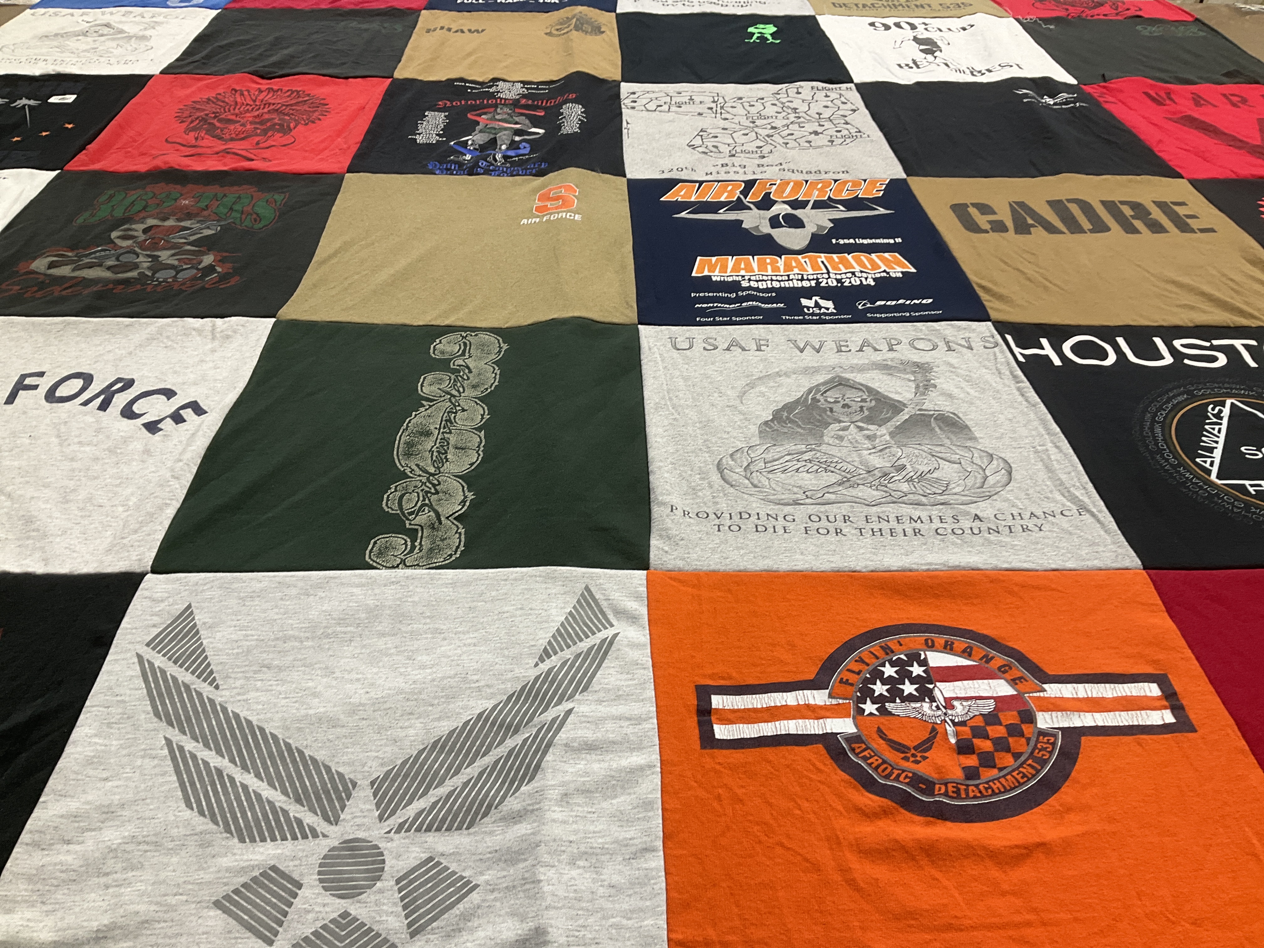 T-shirt quilt with military, running themes by Katy from NY
