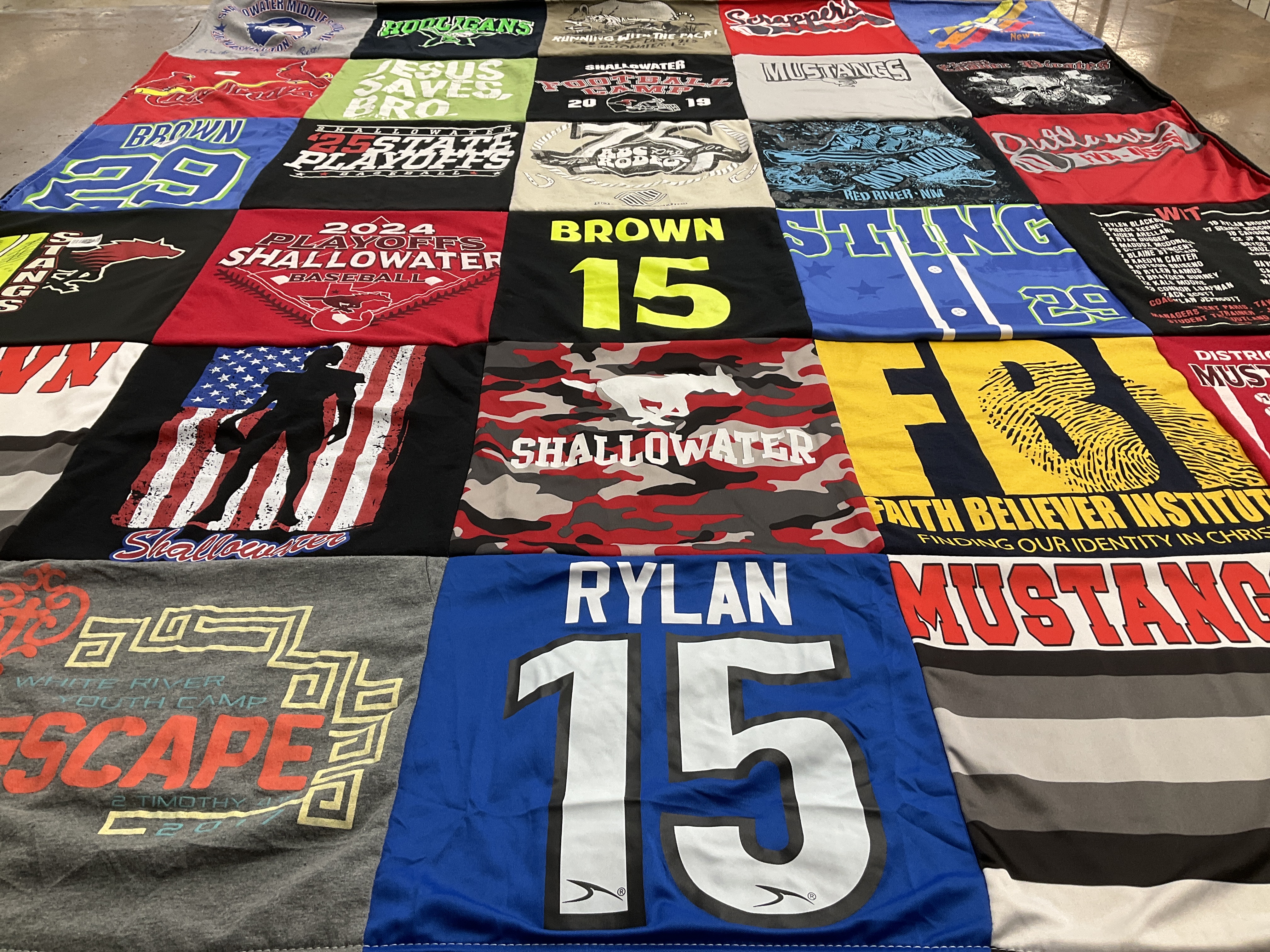 T-shirt quilt featuring shallowater mustangs by lisa from TX