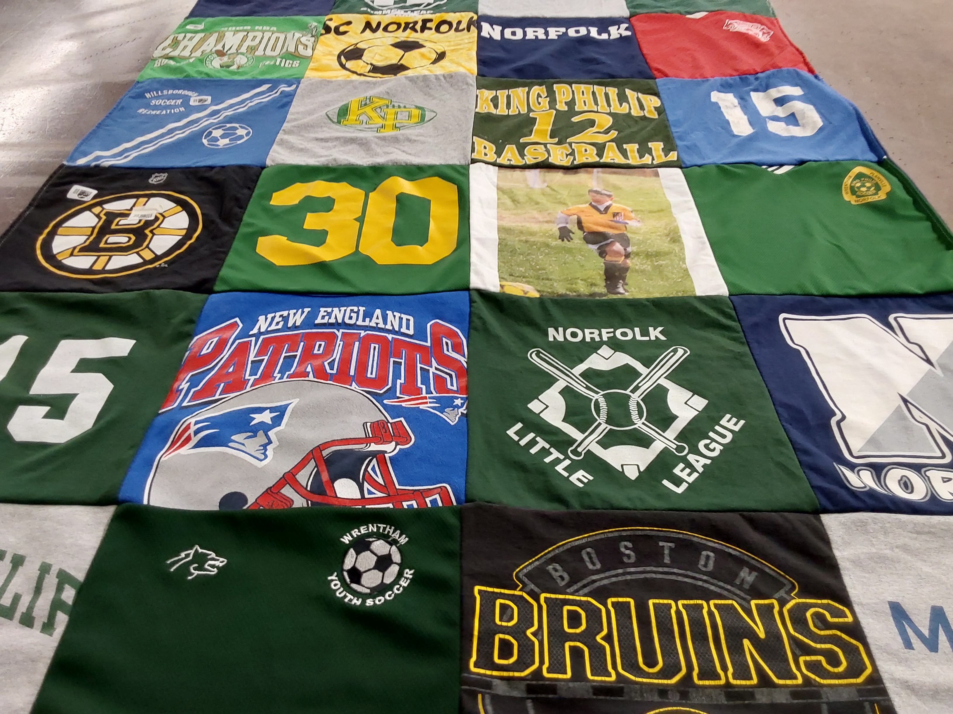 T-shirt quilt featuring boston bruins, new england patriots by Rose from NH