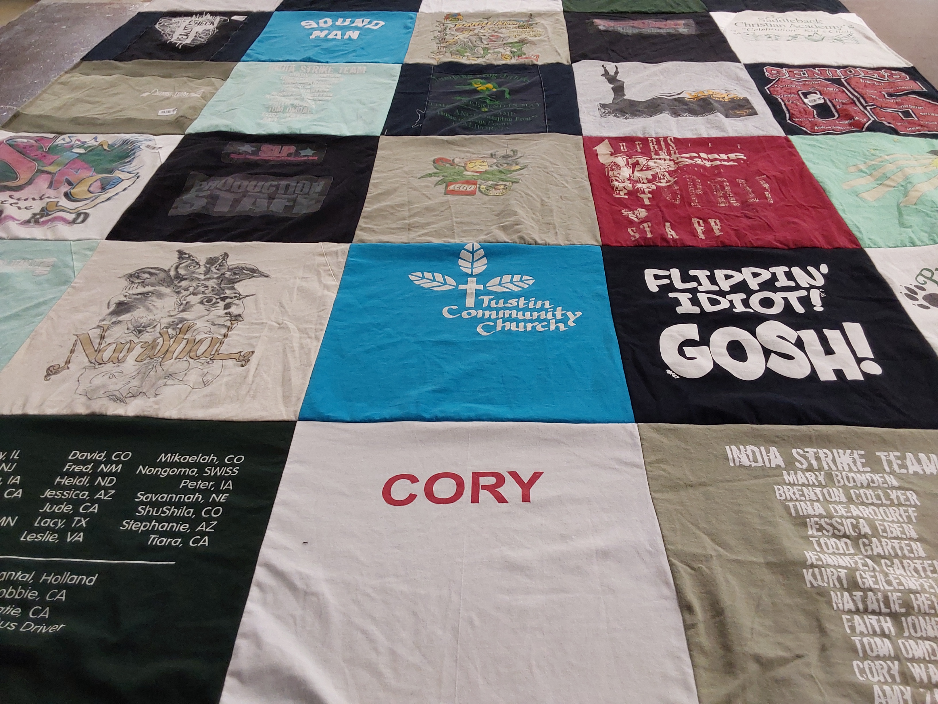T-shirt quilt with community service, music themes by Nancy from CA