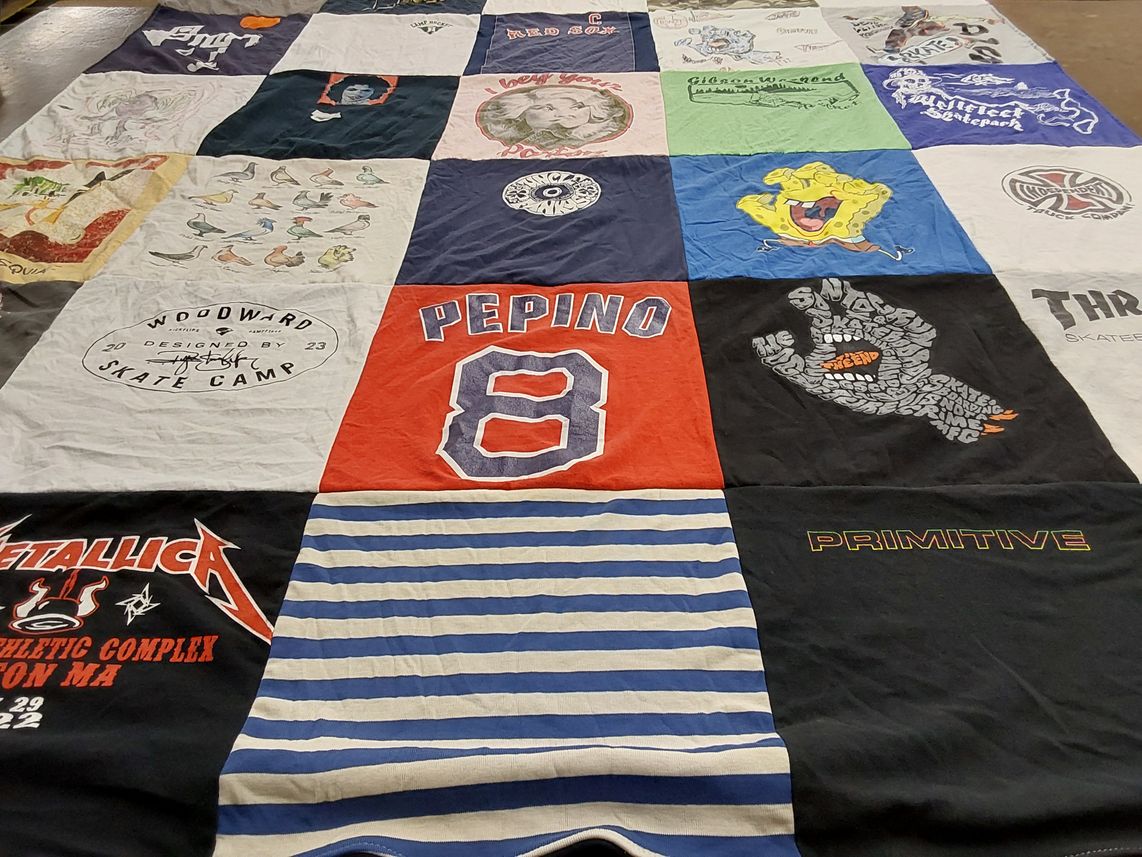 T-shirt quilt with skateboarding, music themes by Lisa from MA