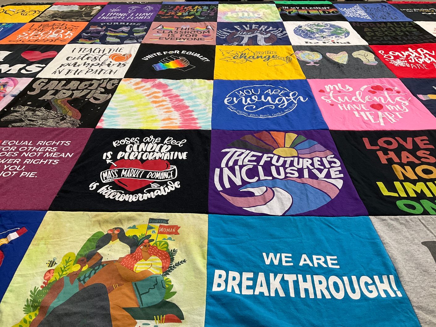 T-shirt quilt with equality, education themes by Naomi from CT