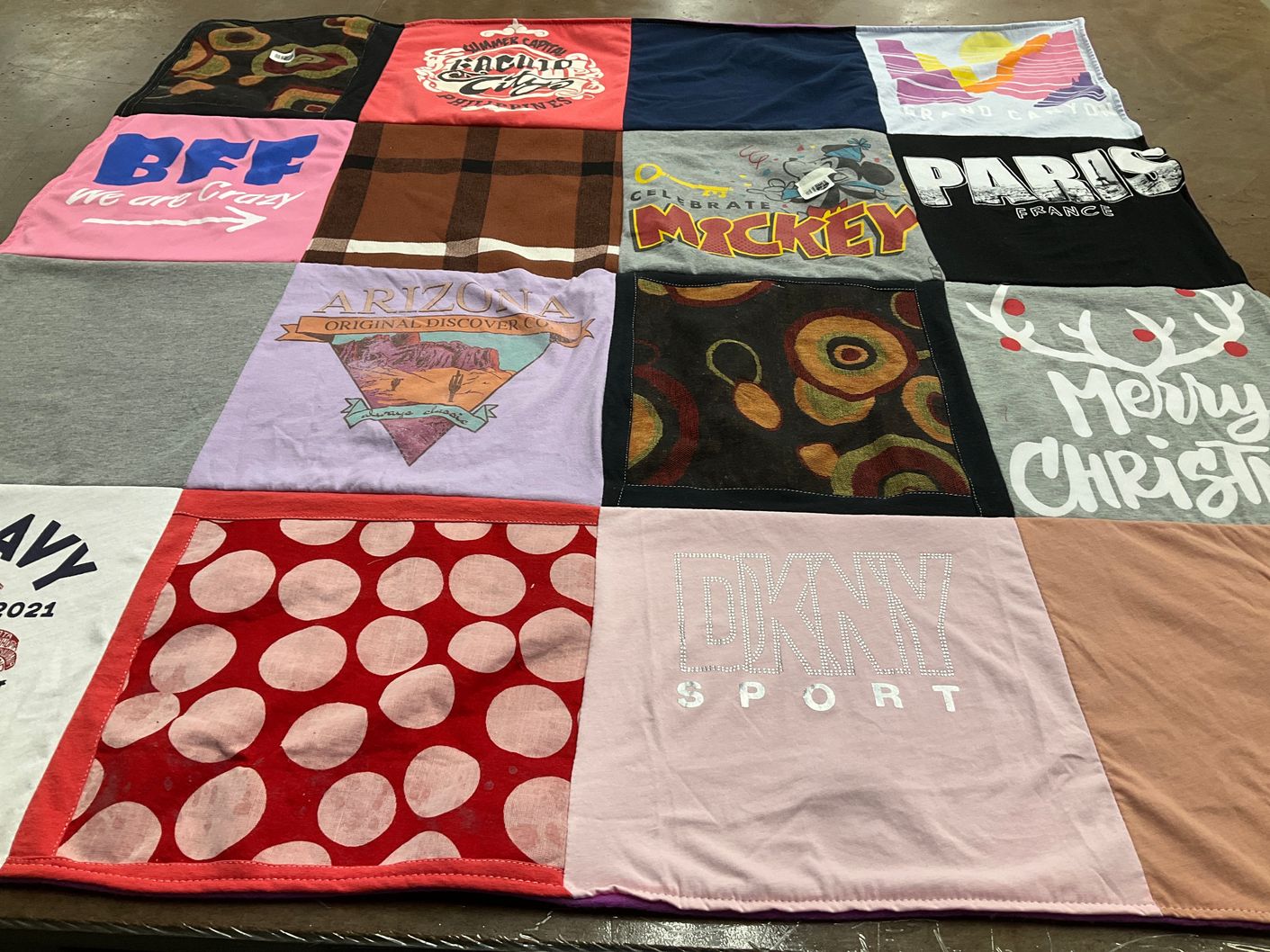 T-shirt quilt with travel, disney themes by Sharon from NJ