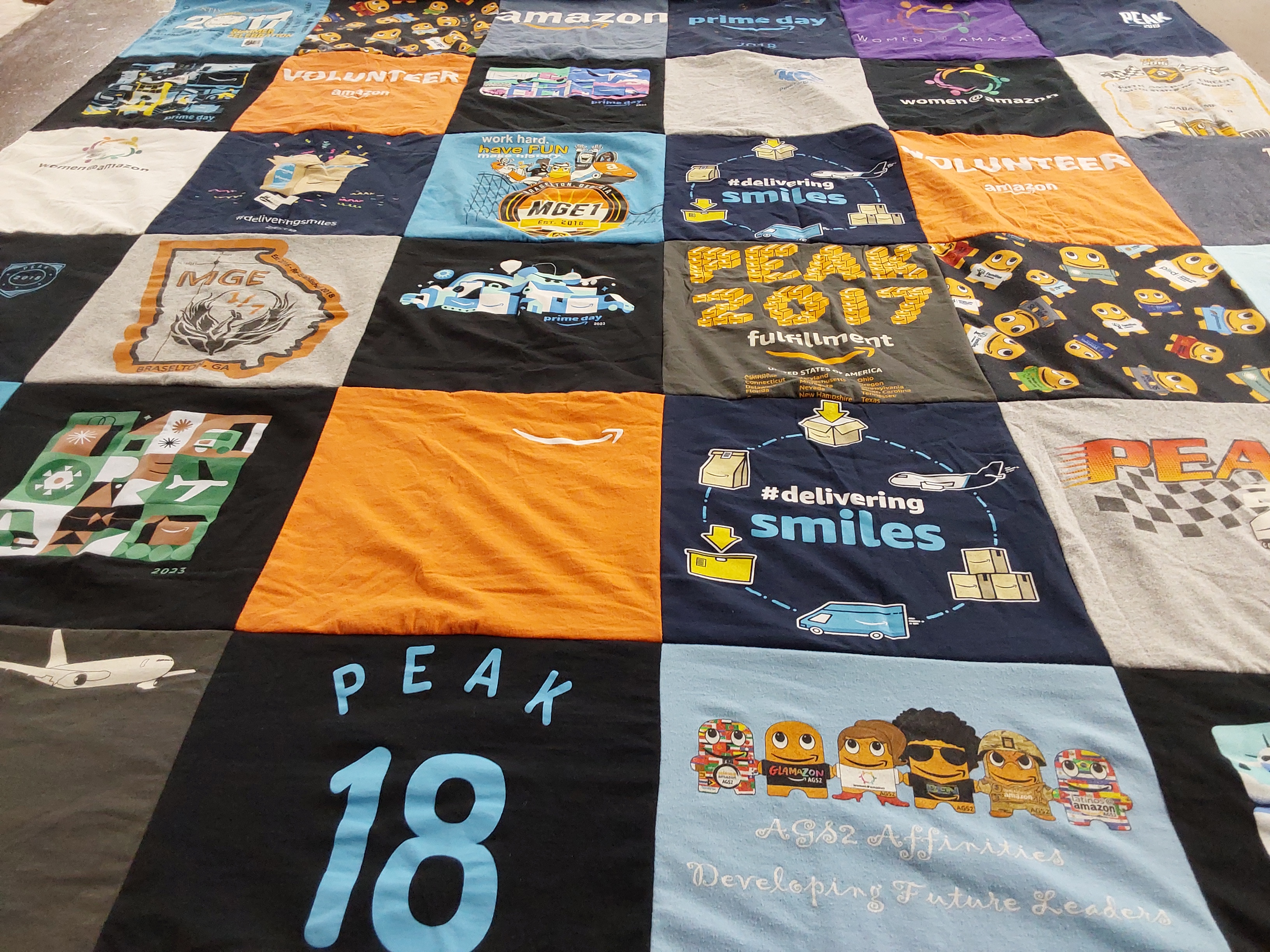 T-shirt quilt with community service, fulfillment logistics themes by Kim from TN
