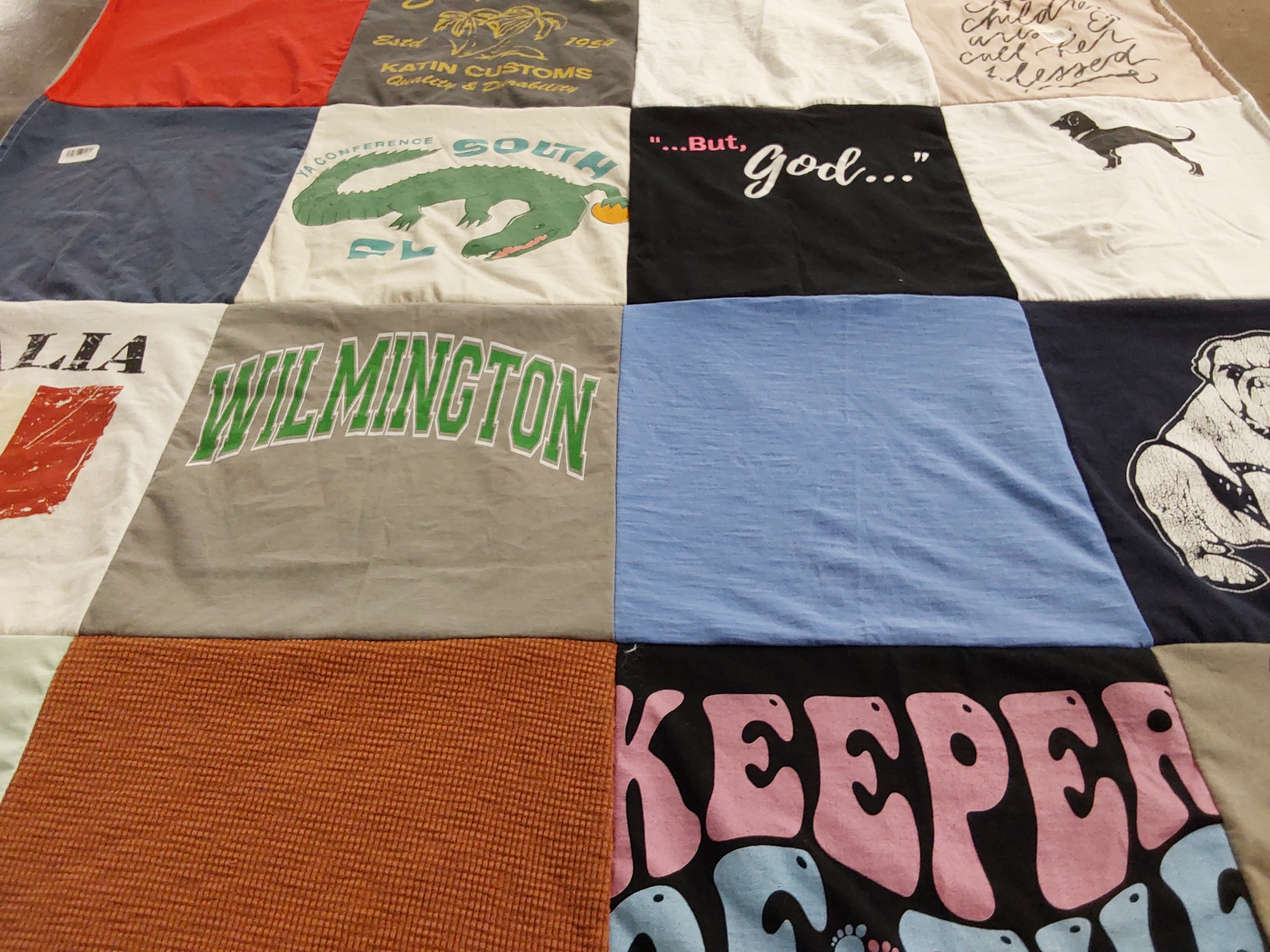 T-shirt quilt with sports, faith themes by Michele from NJ