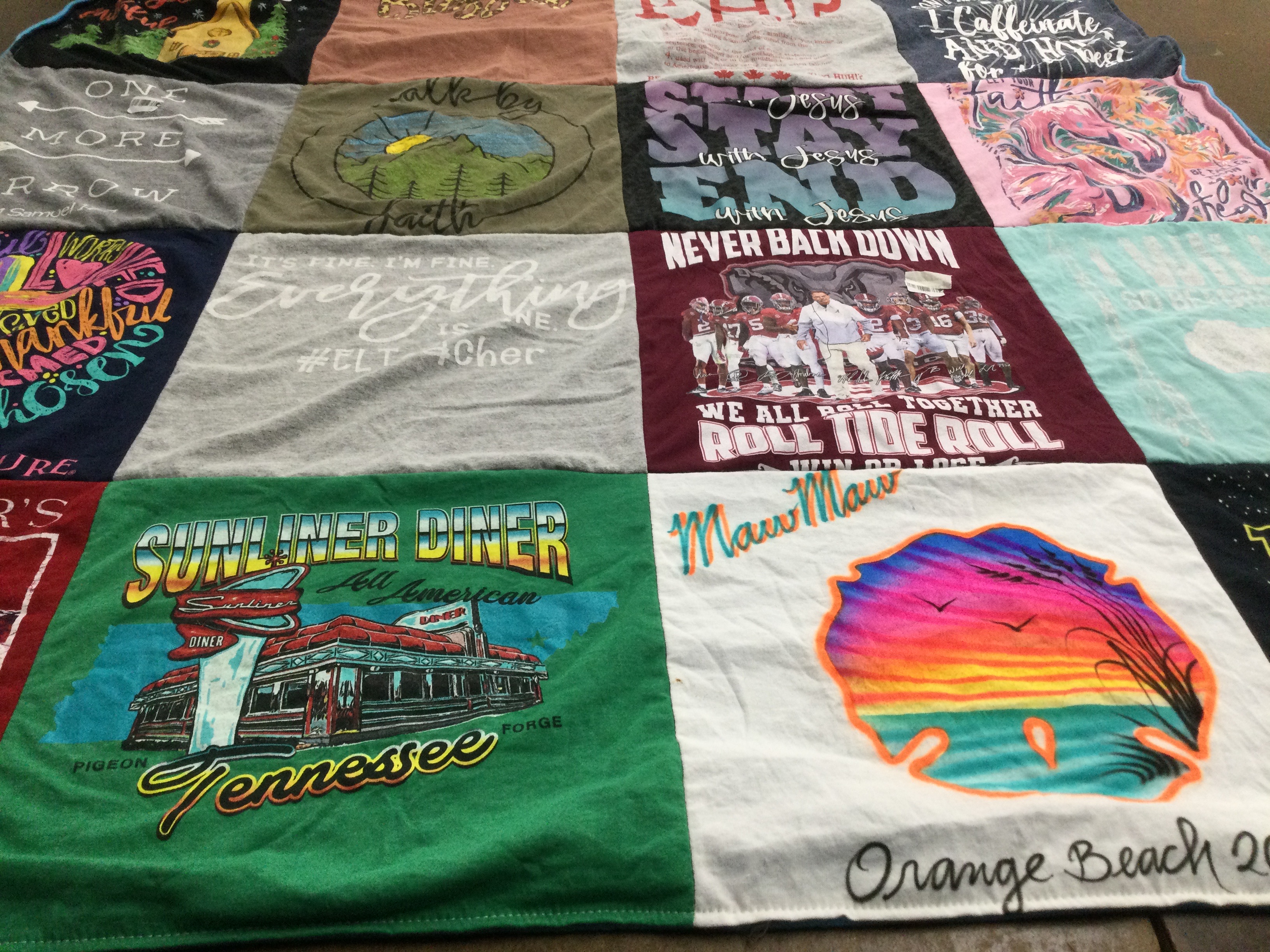 T-shirt quilt with travel, teaching themes by Pamela from AL