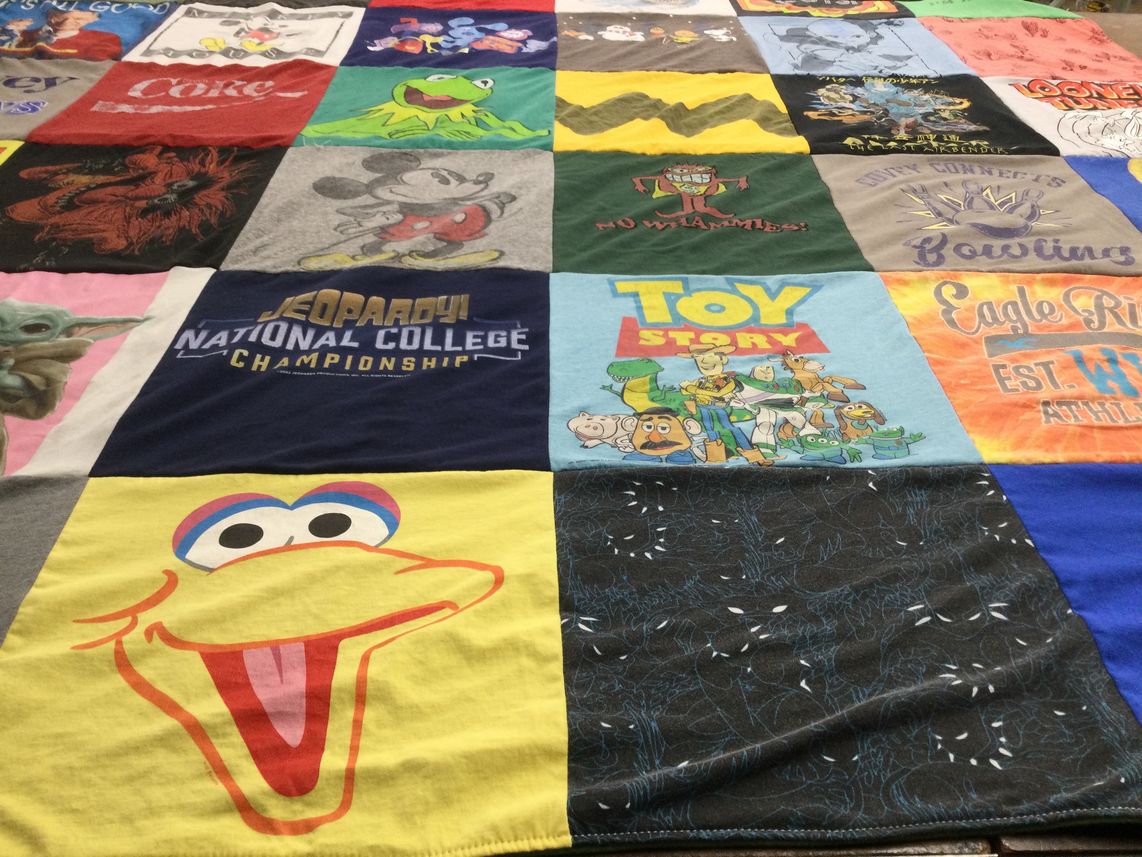 T-shirt quilt with disney, games themes by Jacqueline from WI
