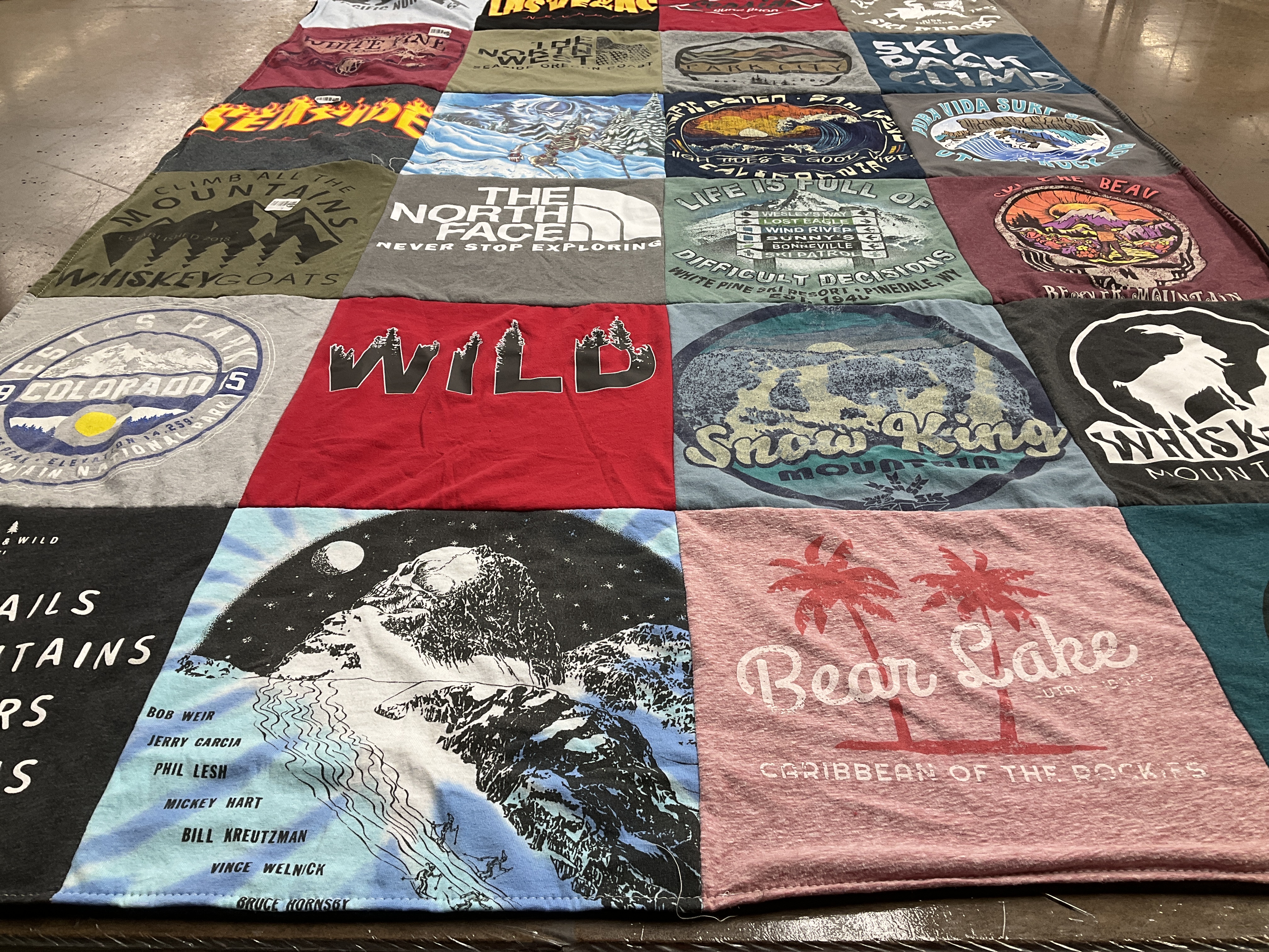 T-shirt quilt with outdoors, skiing themes by Israel from WY