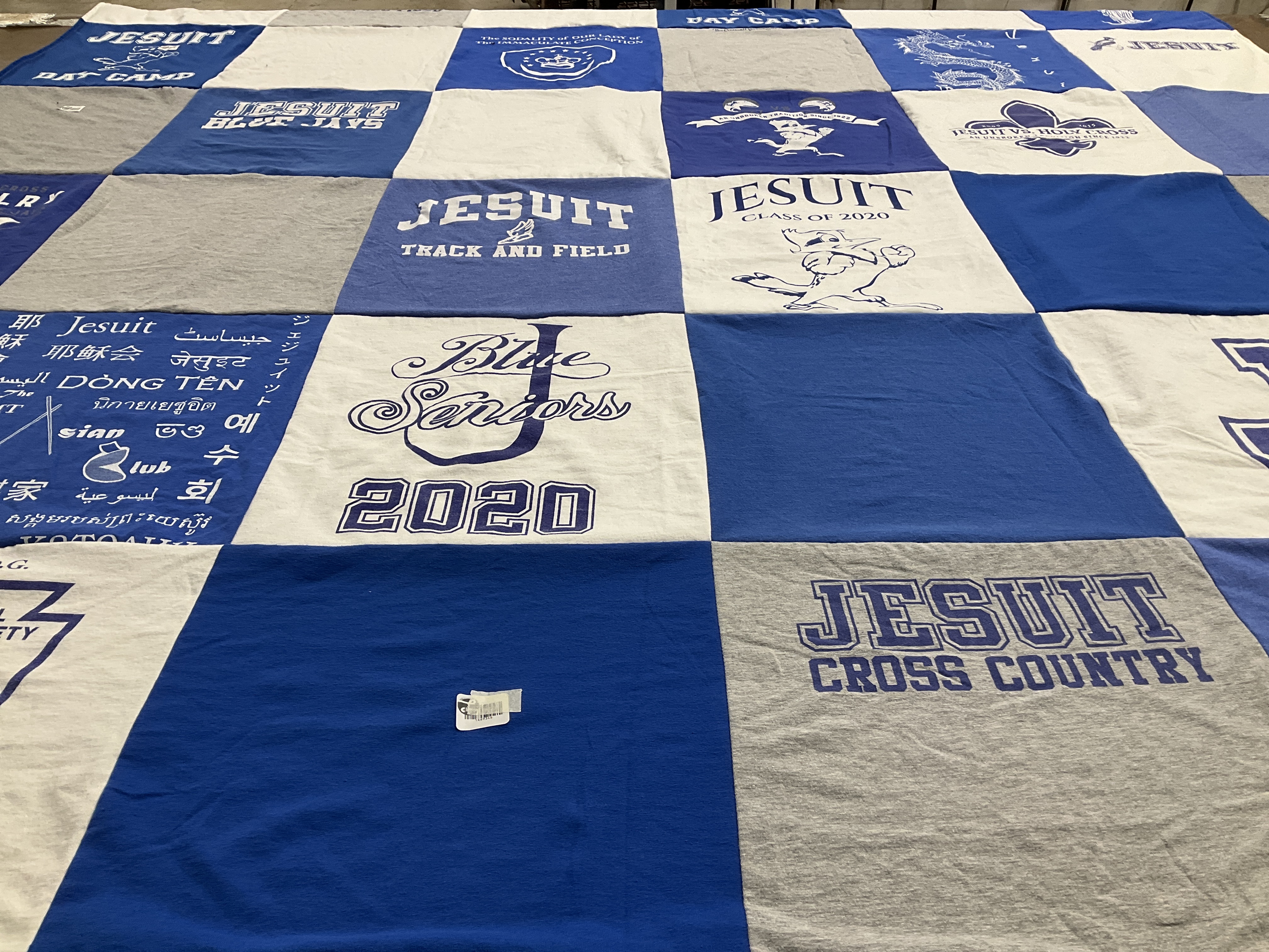 T-shirt quilt featuring jesuit cross country team, jesuit track and field team by valerie from LA