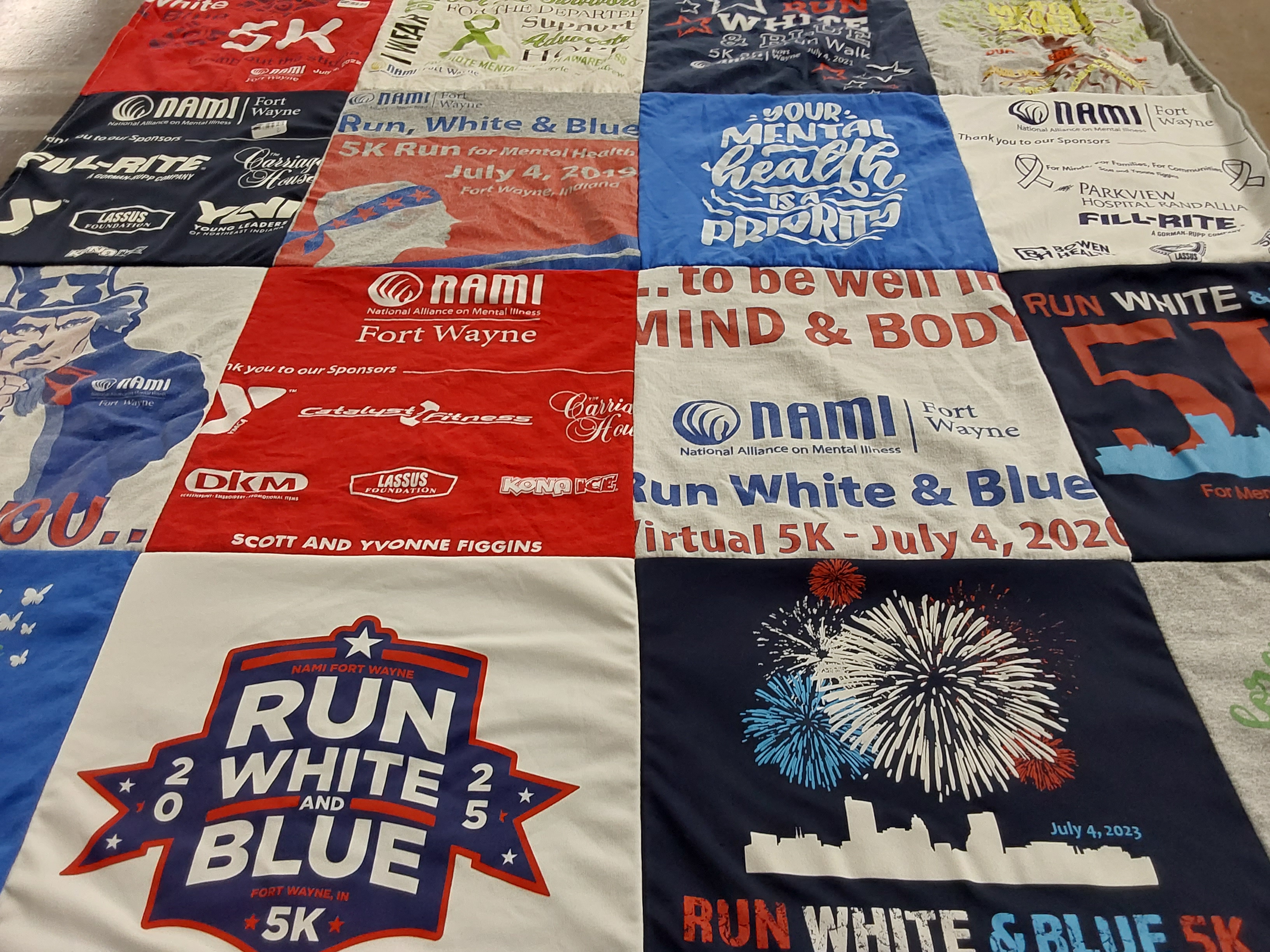 T-shirt quilt with mental health, community events themes by Catalina from IN
