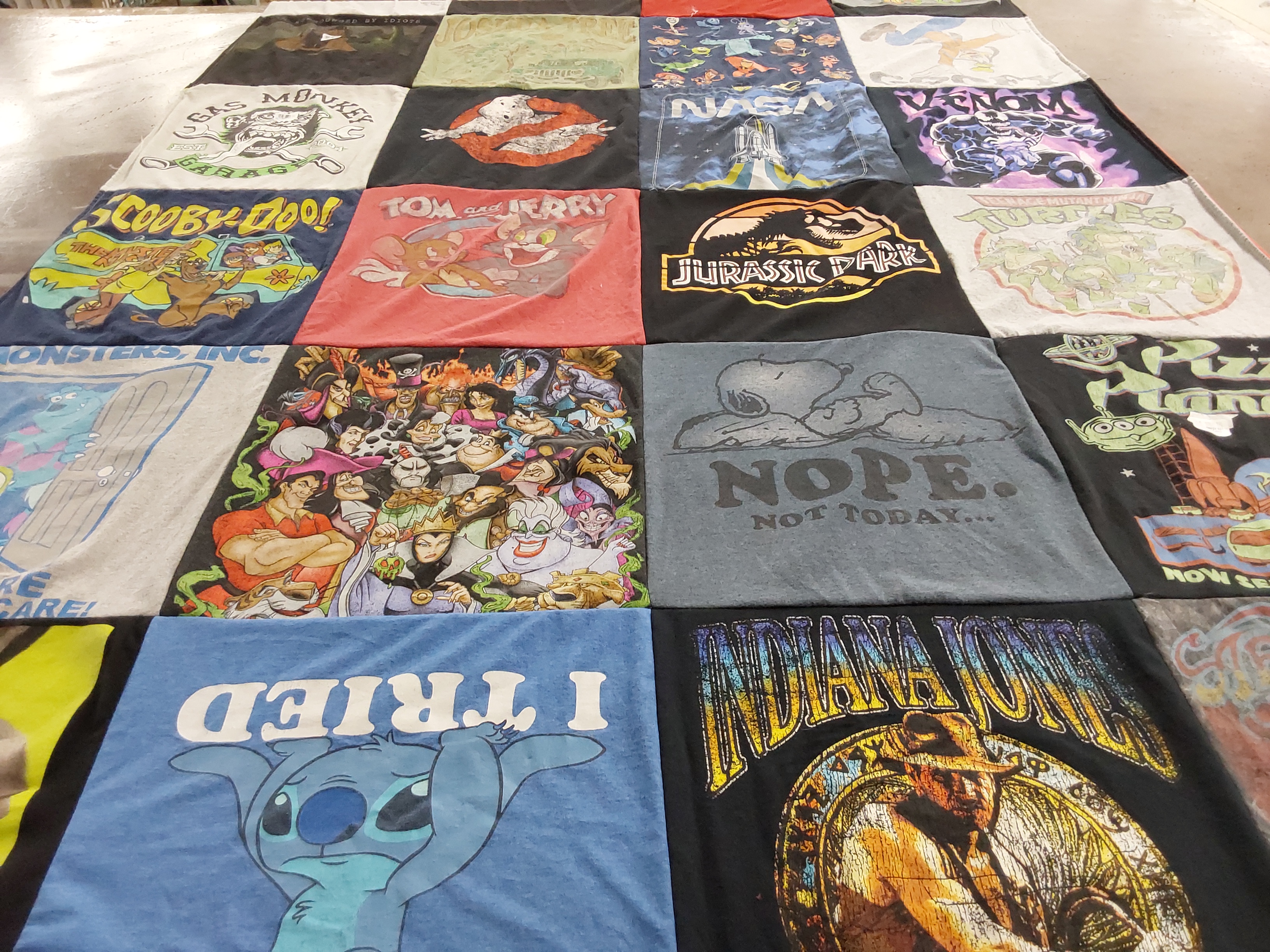 T-shirt quilt with cartoons, movies themes by Ken from IN