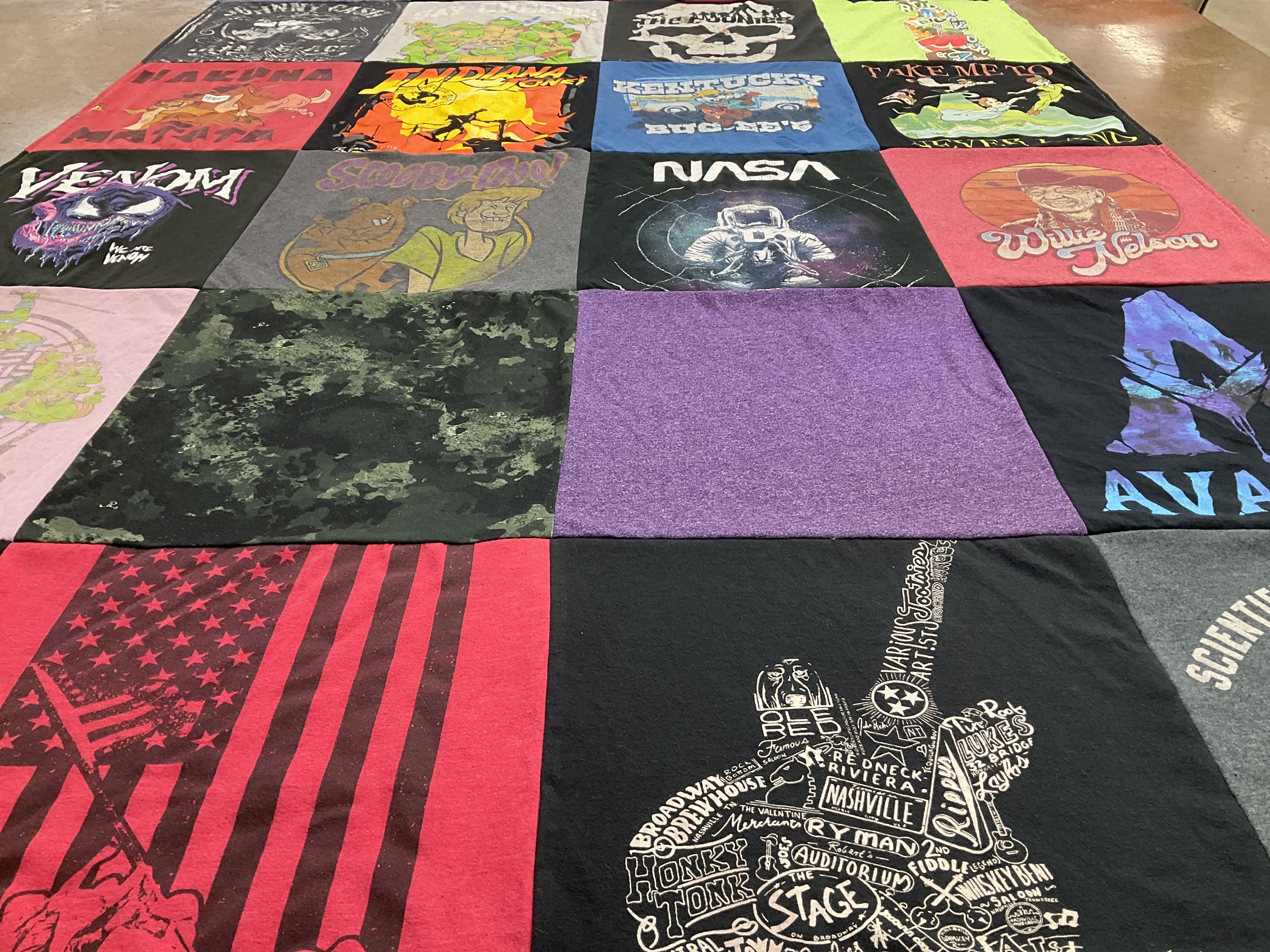 T-shirt quilt with music, cartoons themes by Ken from IN