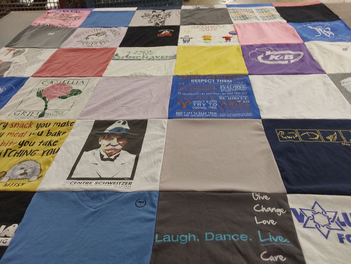 T-shirt quilt with cooking, community service themes by Barbara from DC