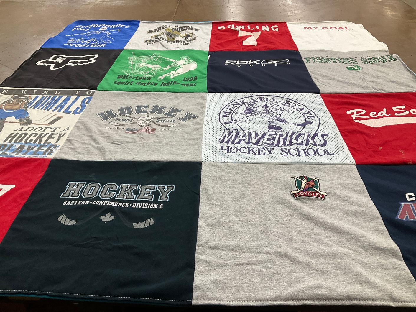 T-shirt quilt featuring fighting sioux, mavericks hockey school by Stephanie from SD
