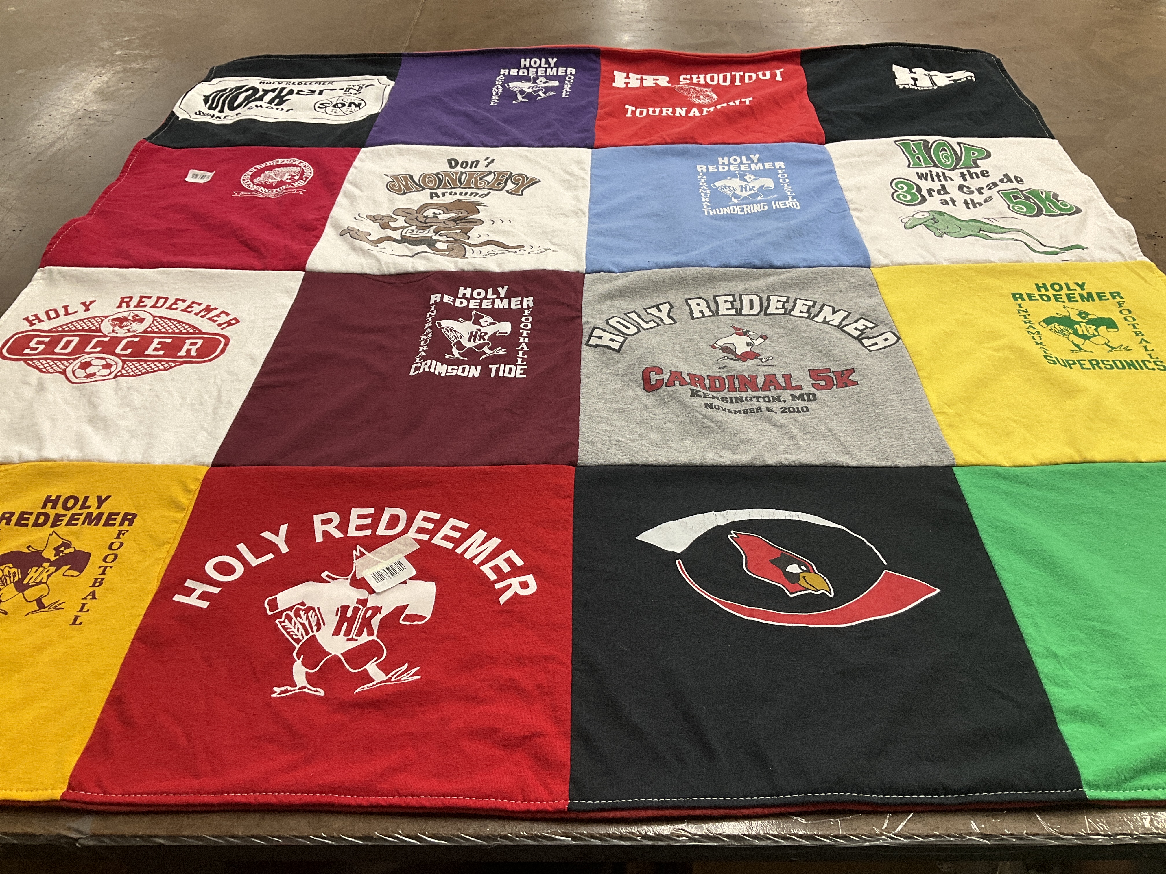 T-shirt quilt with sports, running themes by Sheila from MD