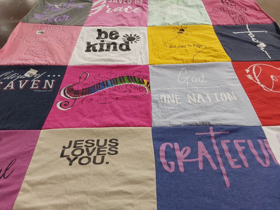 T-shirt quilt with faith, positivity themes by Ann from CA