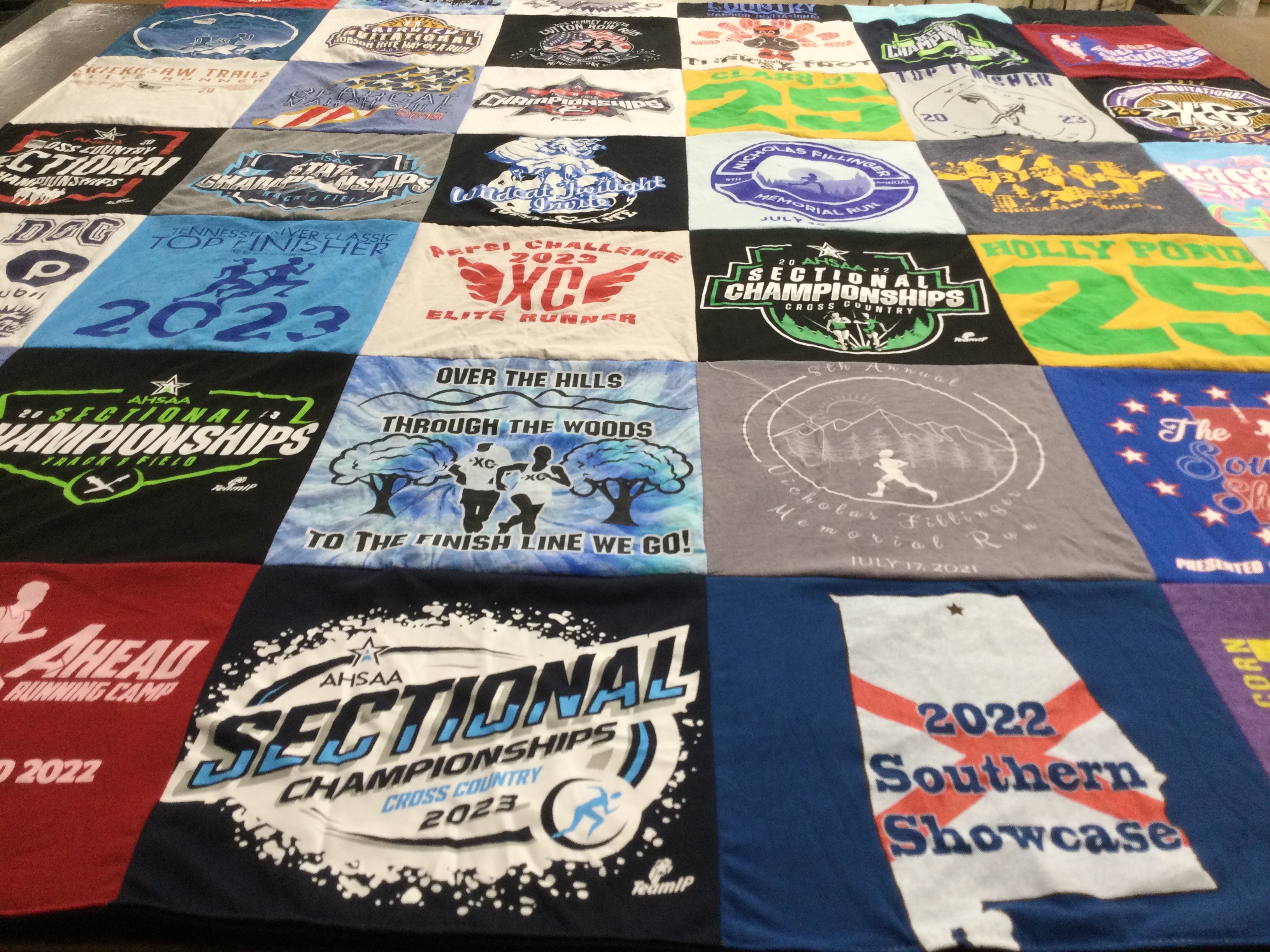 T-shirt quilt with running, cross country themes by Robin from GA
