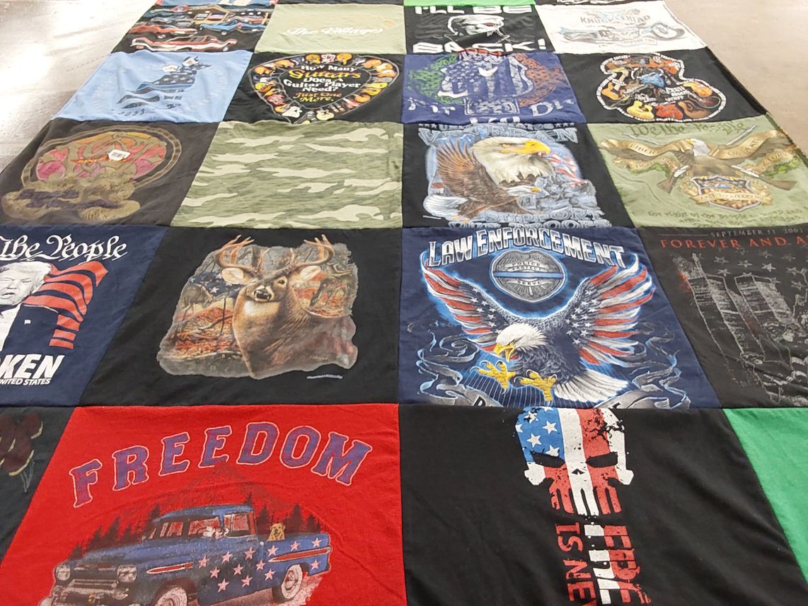 T-shirt quilt with hunting, law enforcement themes by Donna from FL